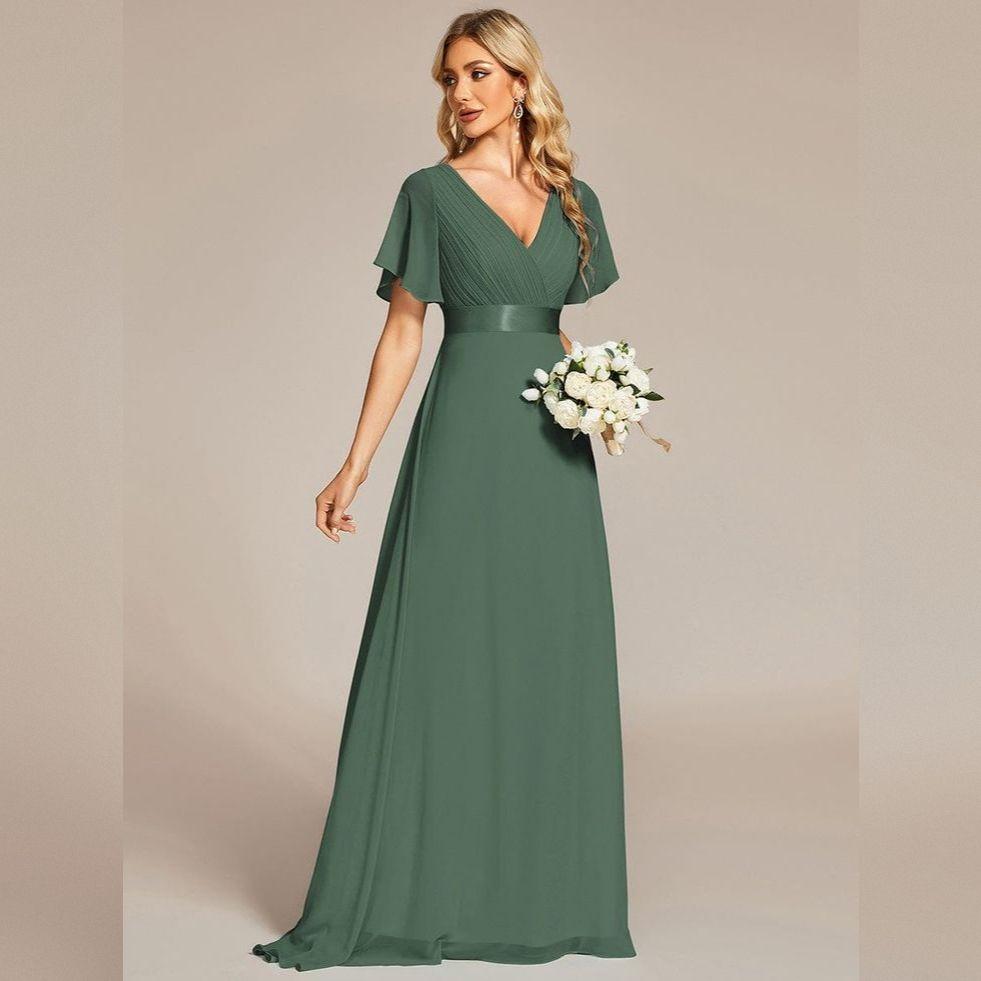 Dress with empire waist and flutter sleeves