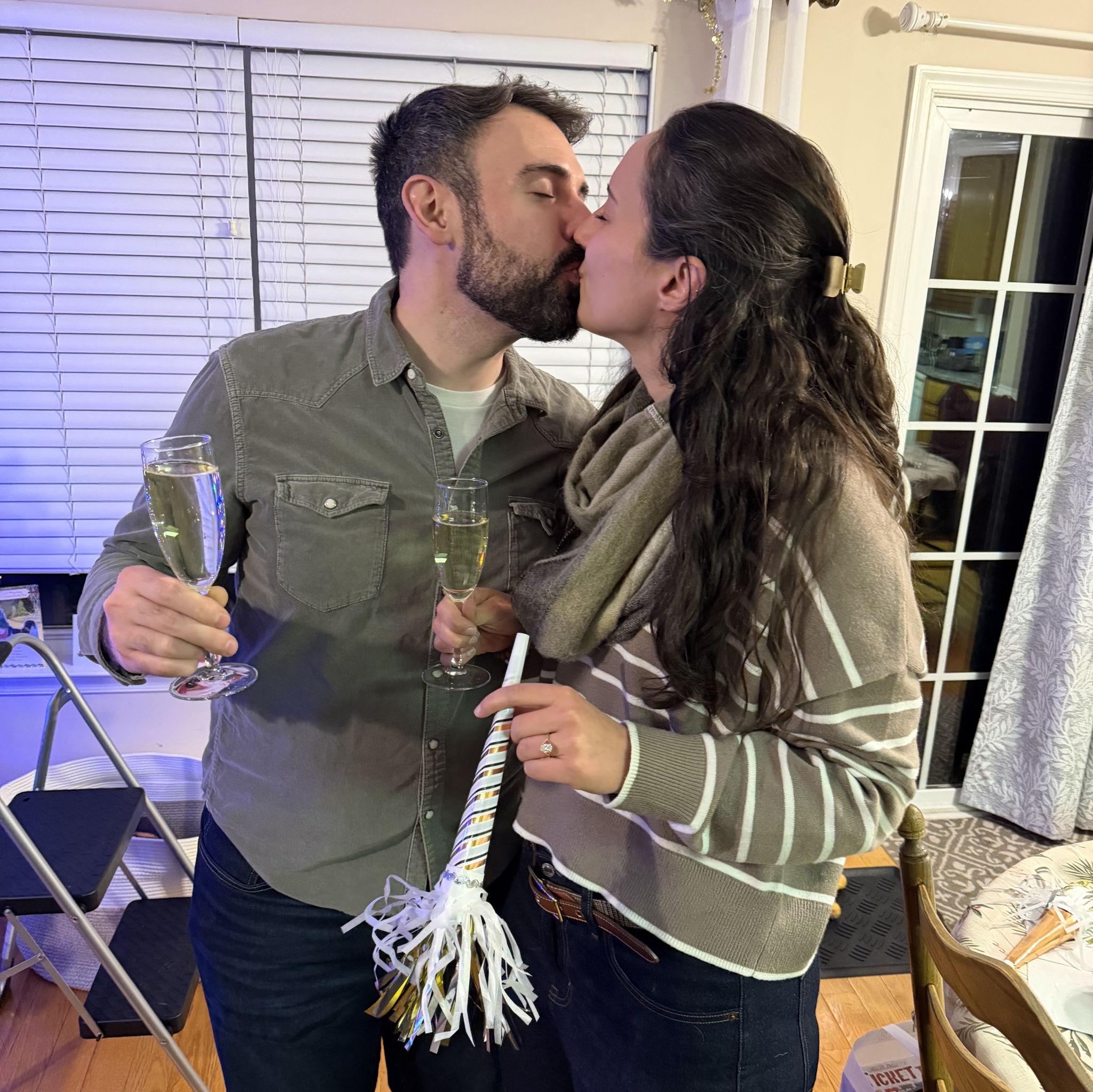 First smooch of our wedding year
