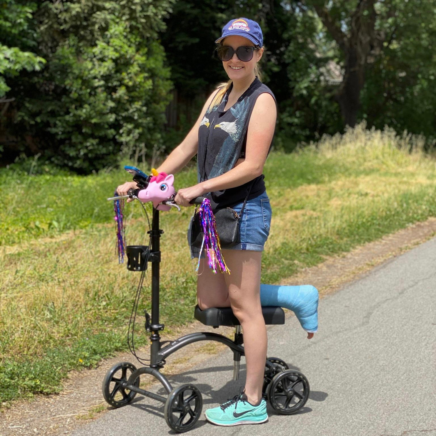 Patrick tricked out Jen's scooter with a unicorn head and tassels. It also included a cup holder and cellphone mount.