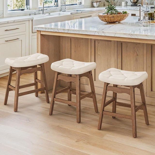 Cozyman Bar Stools Set of 3, 24" H Saddle Counter Stools for Kitchen Counter, Counter Height Upholstered Backless Barstools with Wooden Legs, Faux Leather in Ivory
