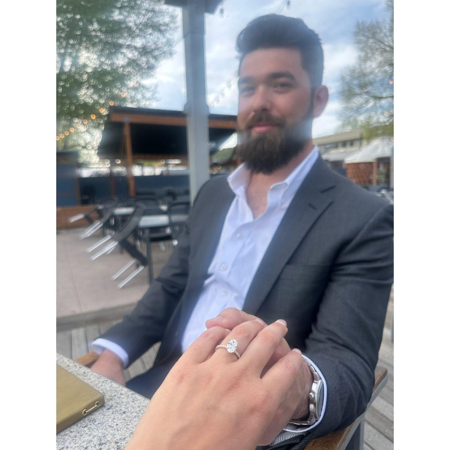 Celebratory drinks right after Aaron proposed!