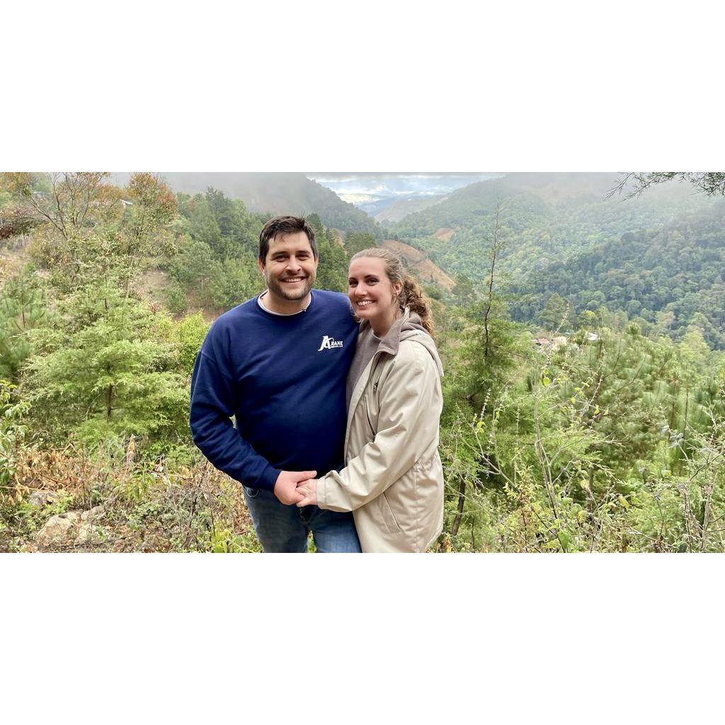 Hiking in the chilly mountains where his family is building a cabin.