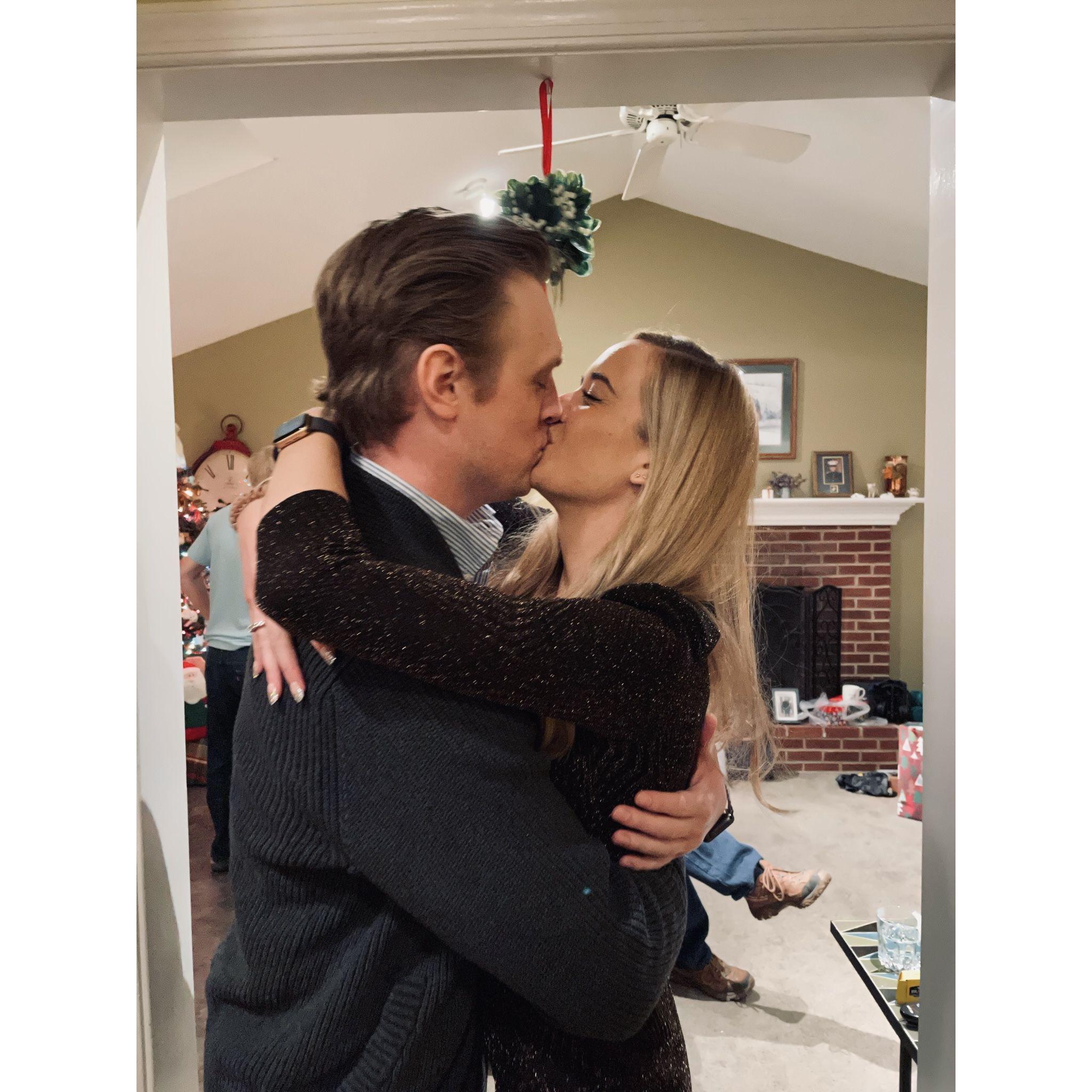 First kiss under the mistletoe
