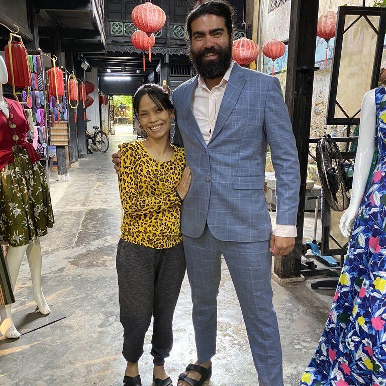 Hoi An in Vietnam is famous for its expert seamstresses. This is Kerem in his brand new, custom-made suit next to his skilled tailor.