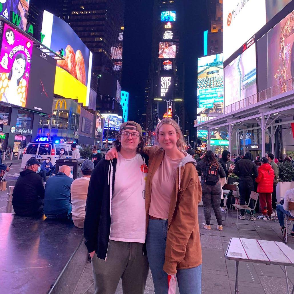 Us in times square on our trip to New York City with my (Emily) mom