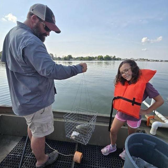 Bryan and Everly crabbing- Everly caught a turtle! July 2025