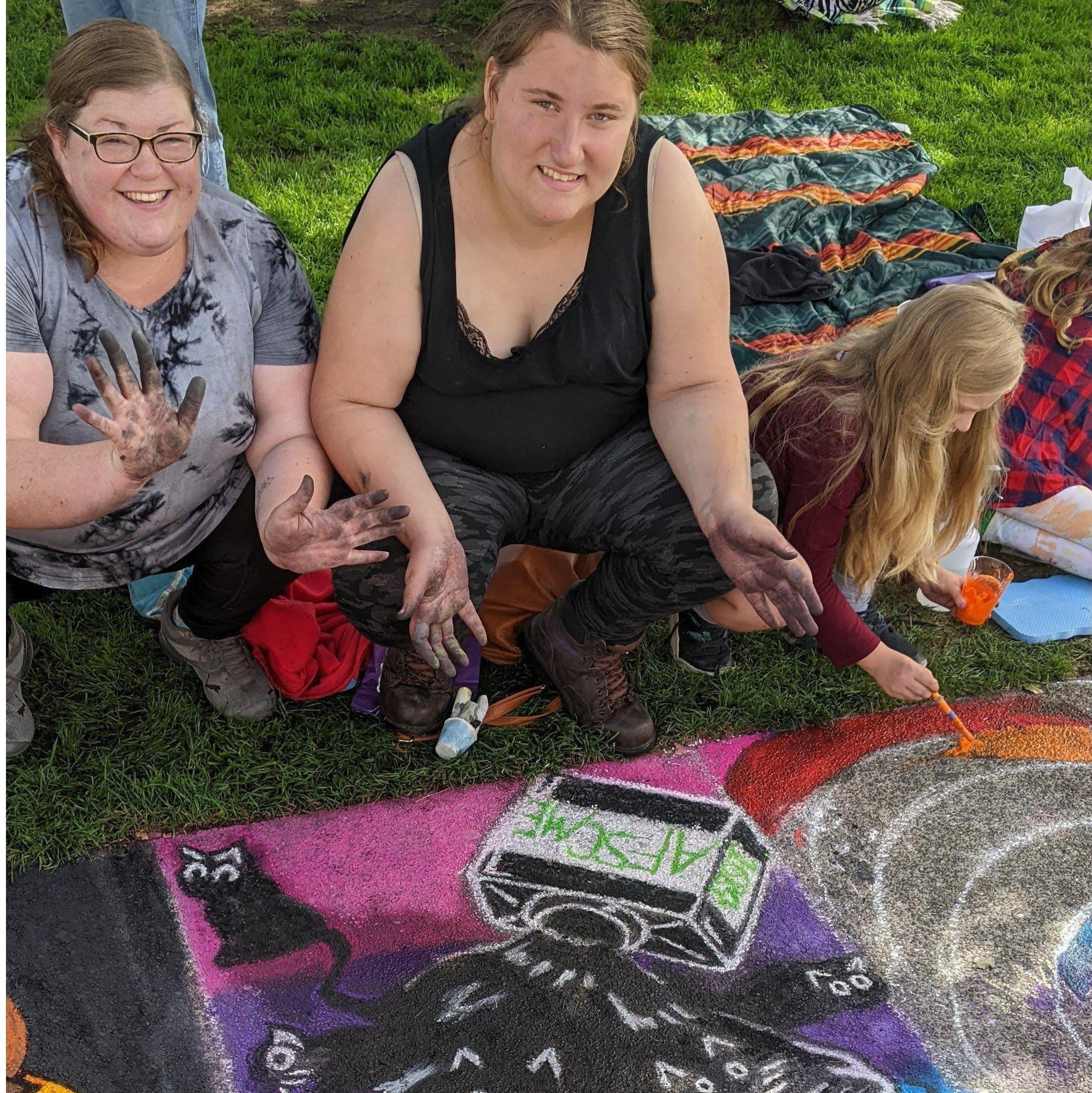 Sarah and her mother have been volunteering as artists for the local Pastels on the Plaza, a fundraiser the first weekend in October.
This year Jessica joined the tradition.