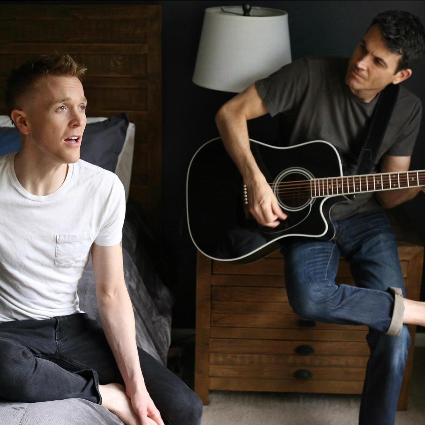 John Patrick sings while David plays.