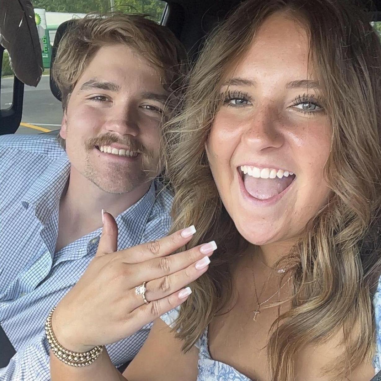 So obviously I said yes.. Eli had someone from high school photograph our engagement, so we took a couple of pictures after and then hopped in the truck to go "show his mom the ring"...