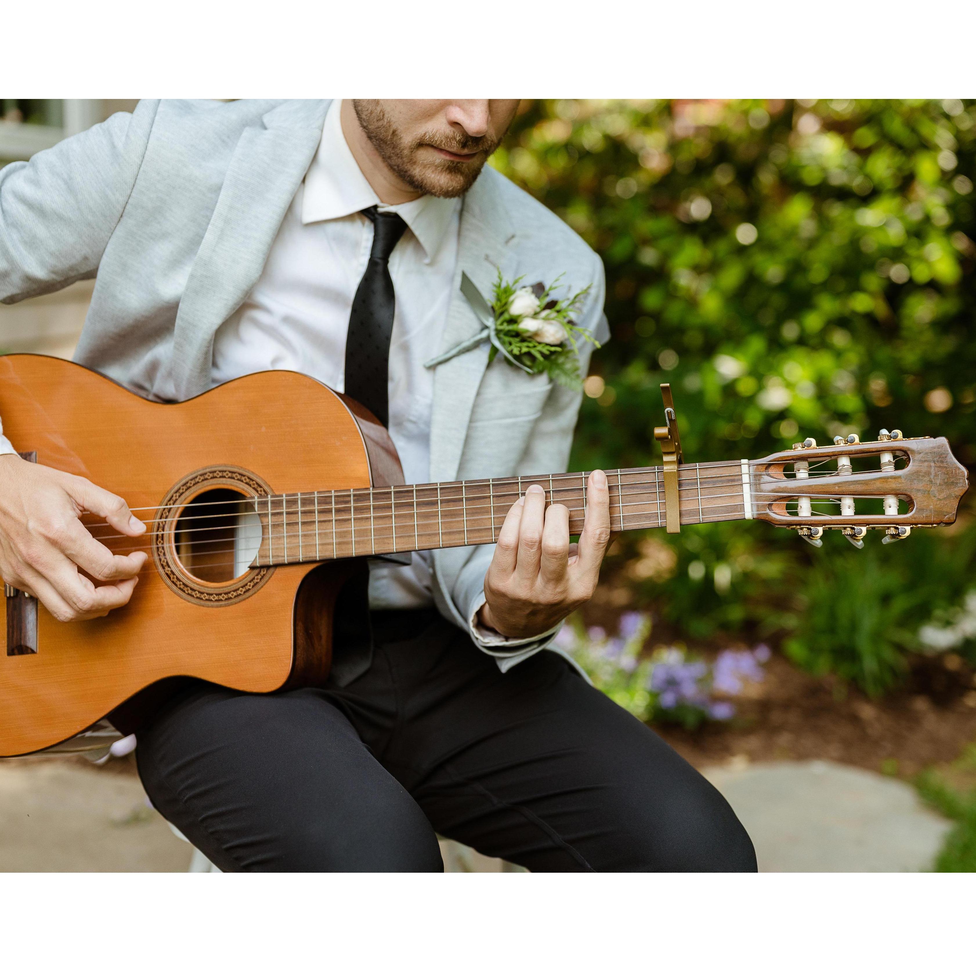 Sean's brother, Mike, playing their wedding song 'Waterloo Sunset' by The Kinks, as Lauren's parents walked her down the aisle.