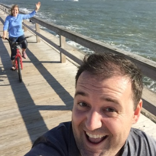 Riding bikes on the boardwalk in Ocean City, MD.