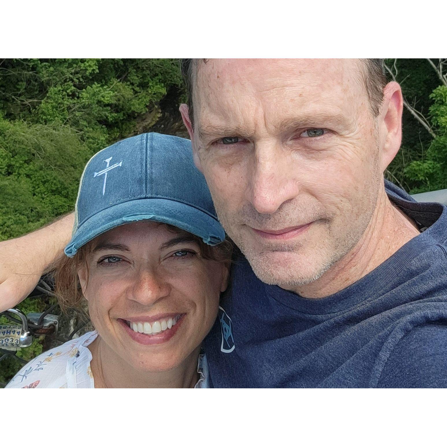 June 8, 2024. Pam knew it was real love because Jim gave up his hat to keep the sun out of her eyes. Love Locks on Vermillion River in Hastings, MN.