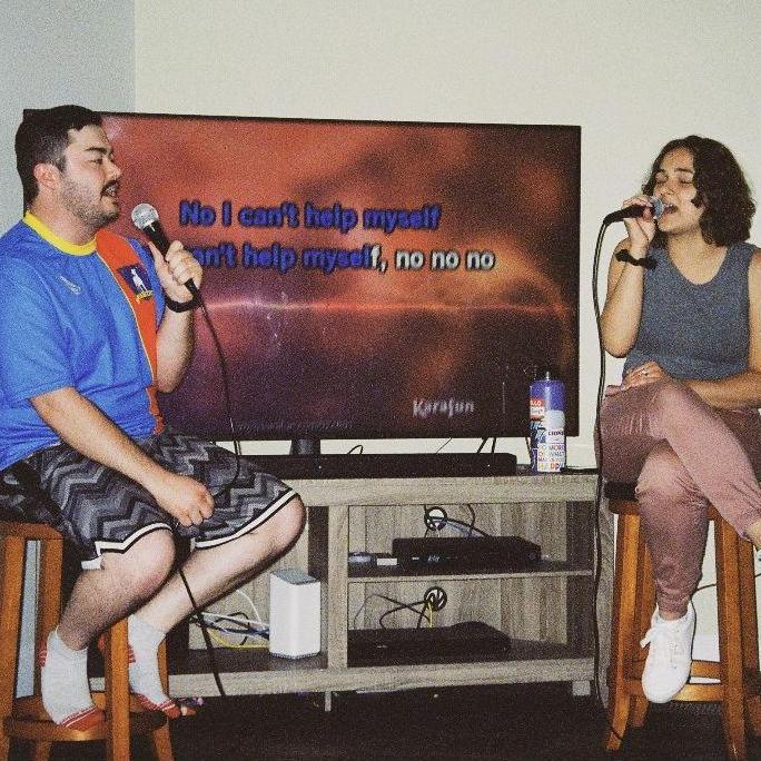 Karaoke night with friends (2023).