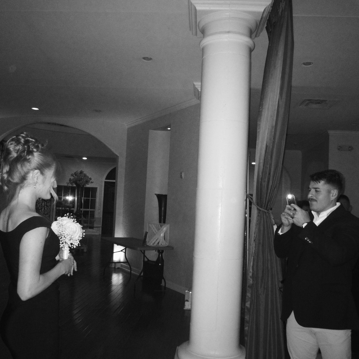 Caught the Bride's bouquet and Justin had to snap a pic!