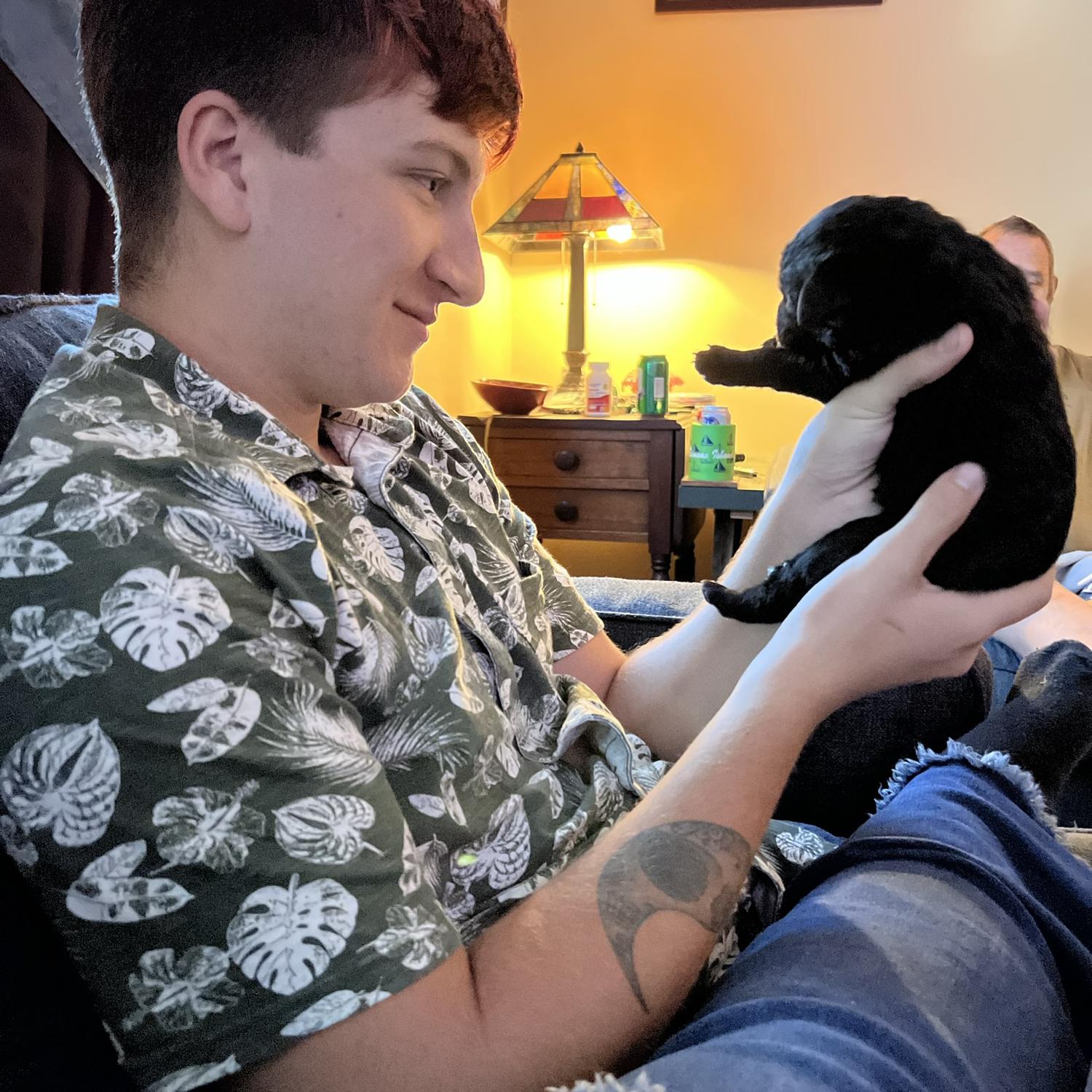 Toby holding our first dog, Kong