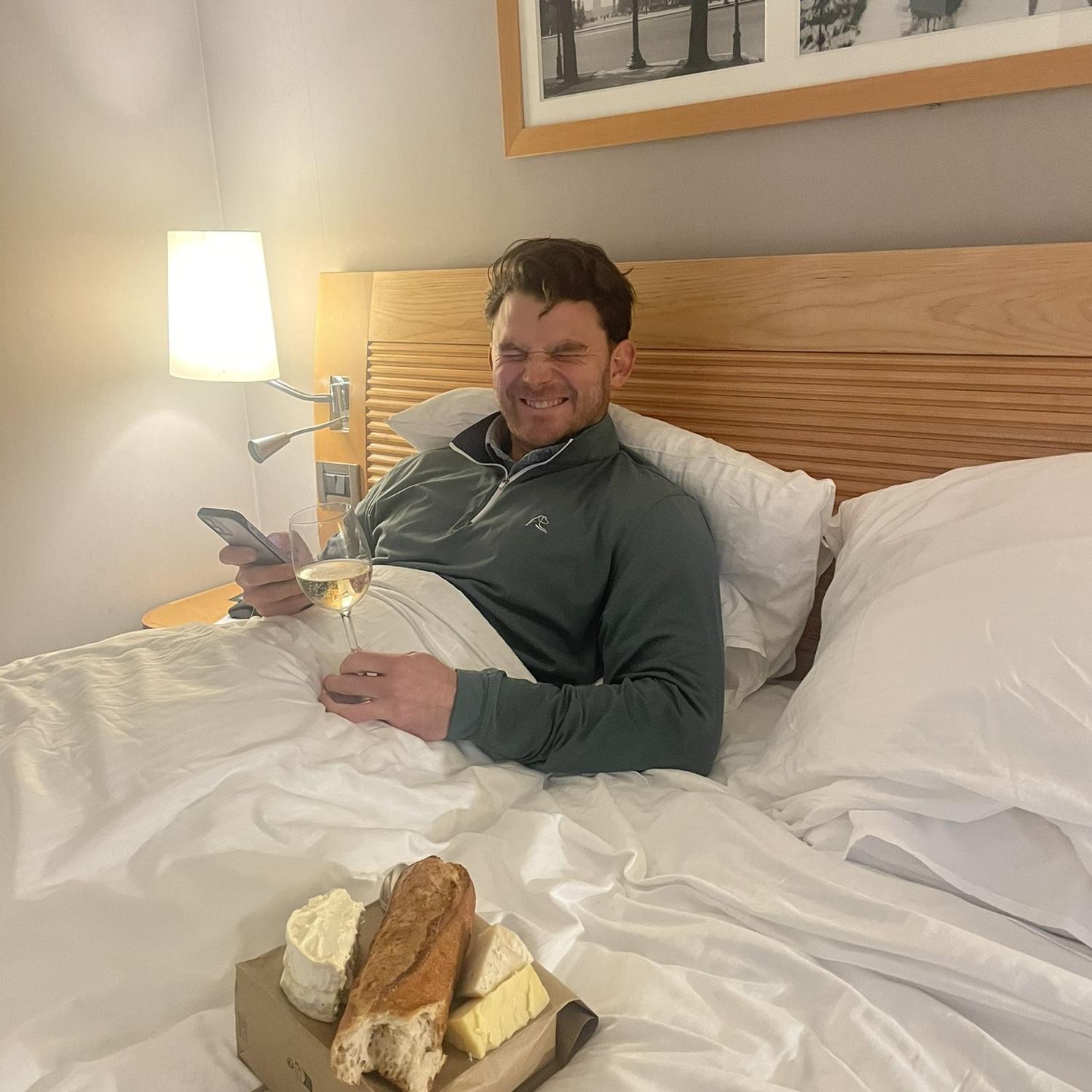 Cheese and champagne in bed in Paris (because Ted was busy working)!