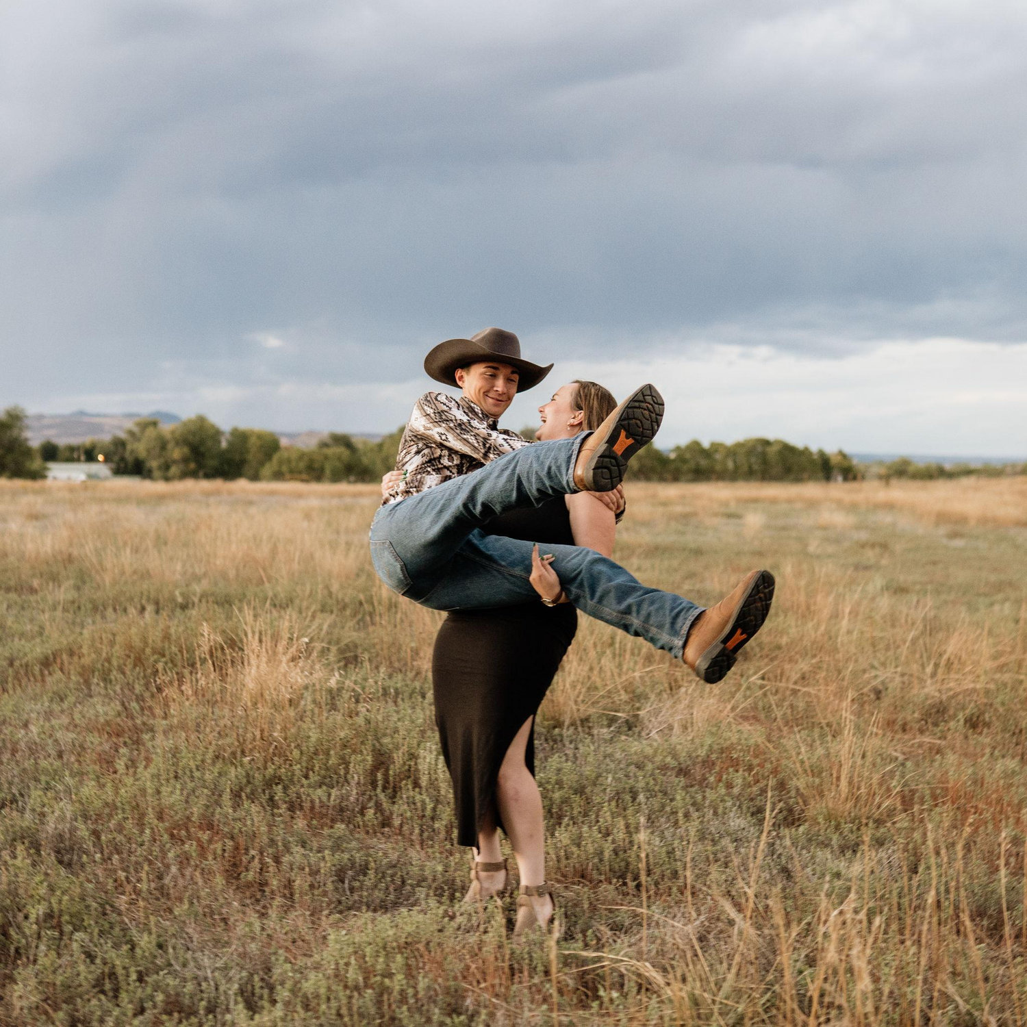 Our amazing photographer turned to us and goes... you wanna do anything silly and without missing a beat Jacob turned to Cassie and said ok my turn and tried jumping in her arms.
