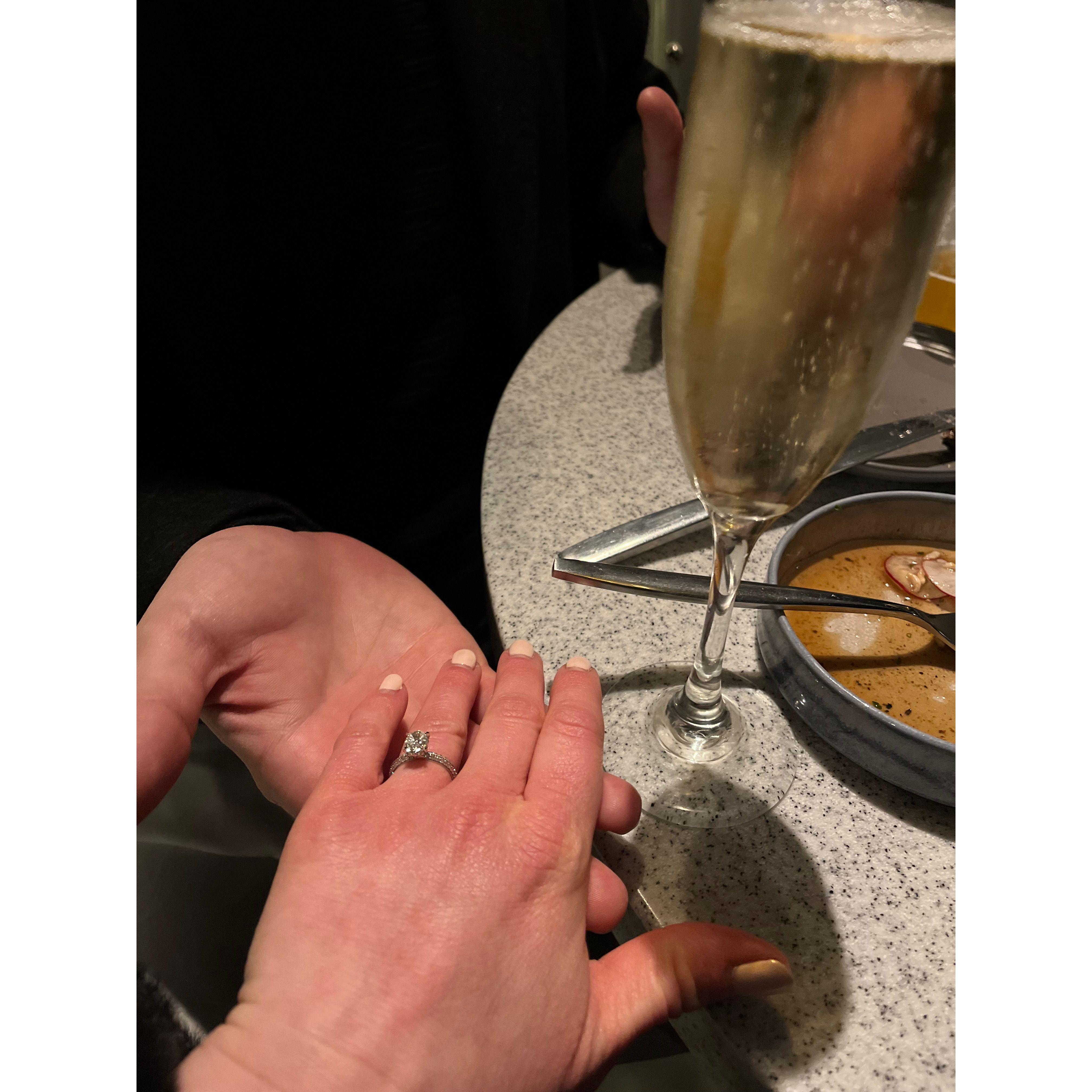 January 21, 2023 - The Night we Got Engaged! Us at dinner celebrating!