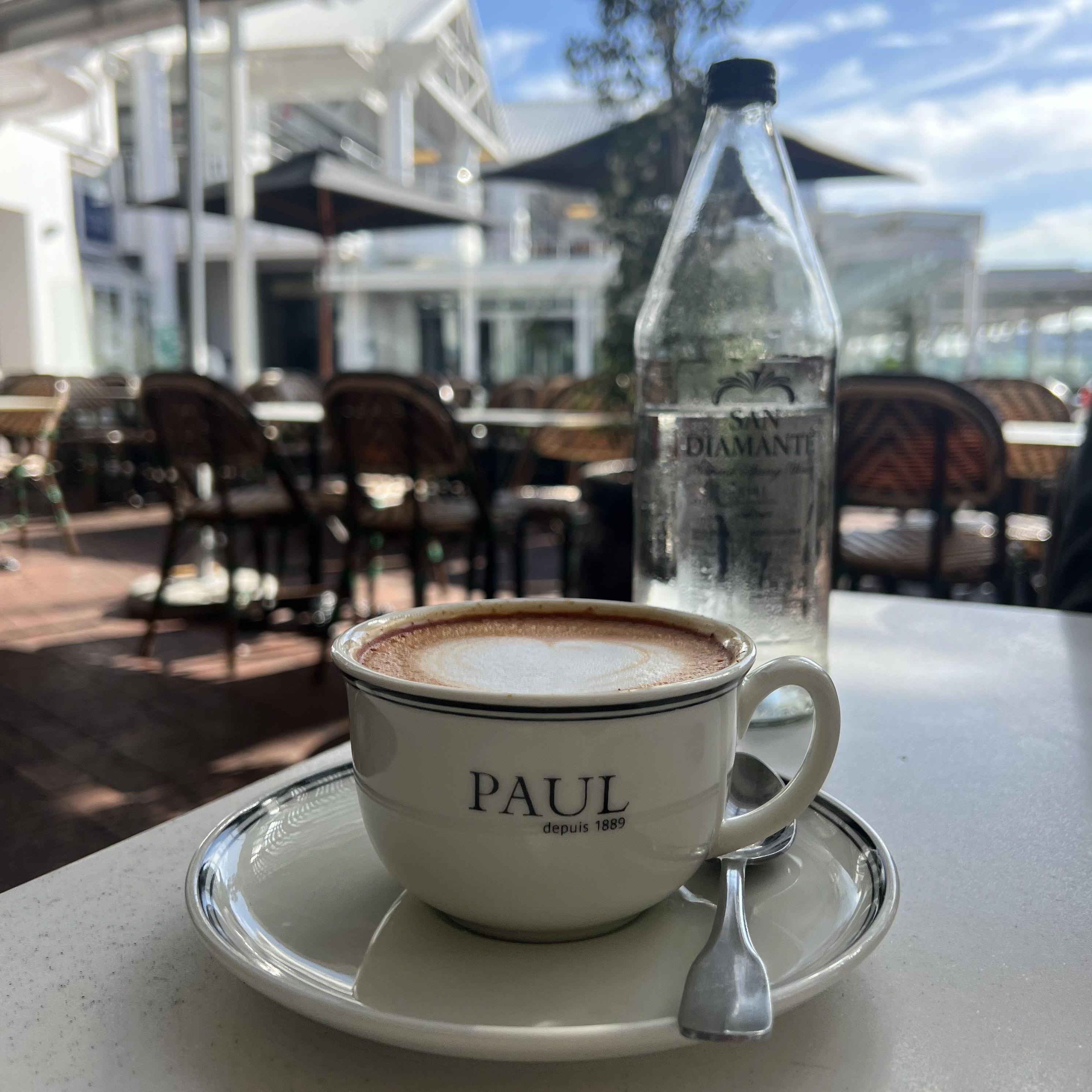 Grabbing red cappuccinos and breakfast at Paul’s Patisserie at the V&A Waterfront.