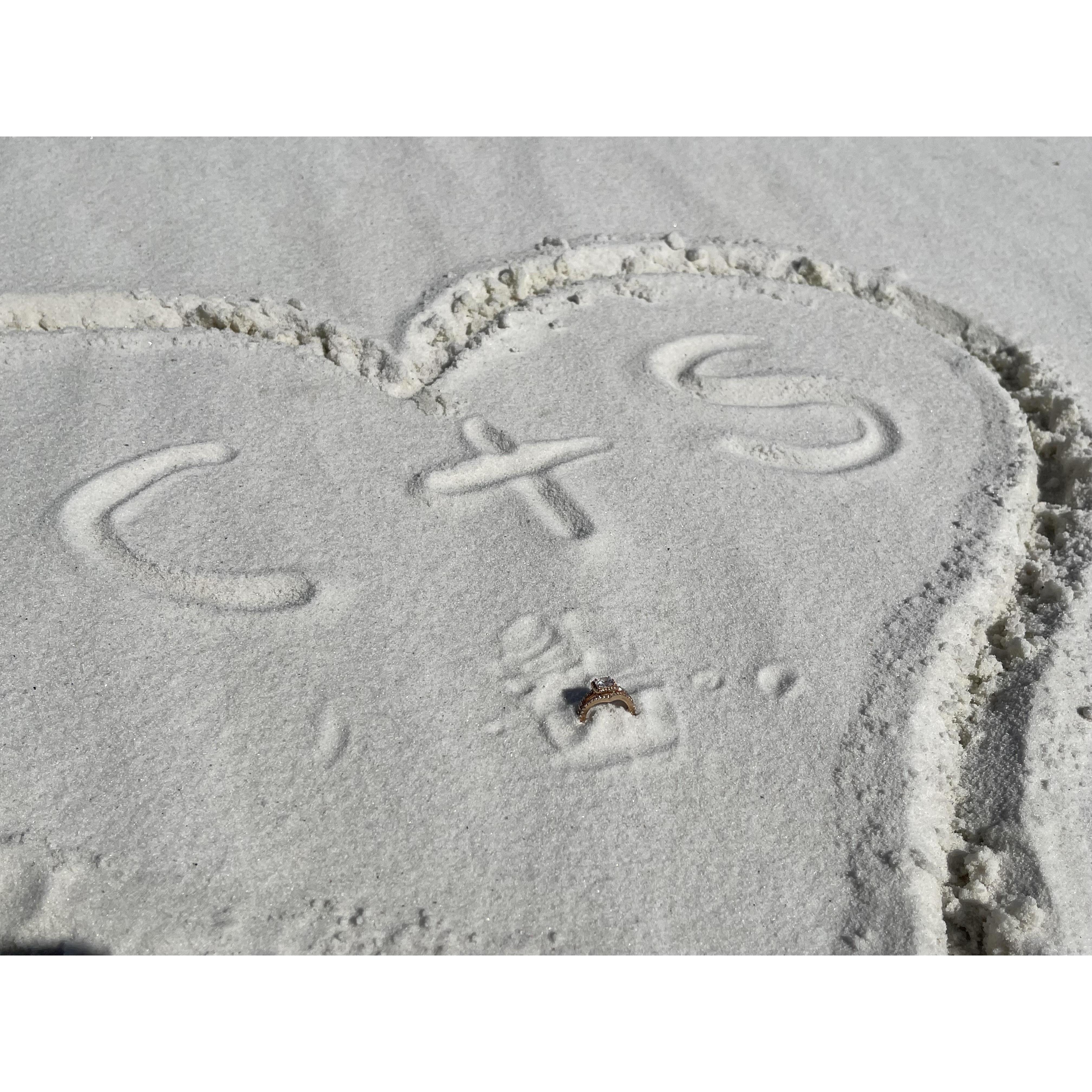 my engagement ring in the sand of Destin, Florida