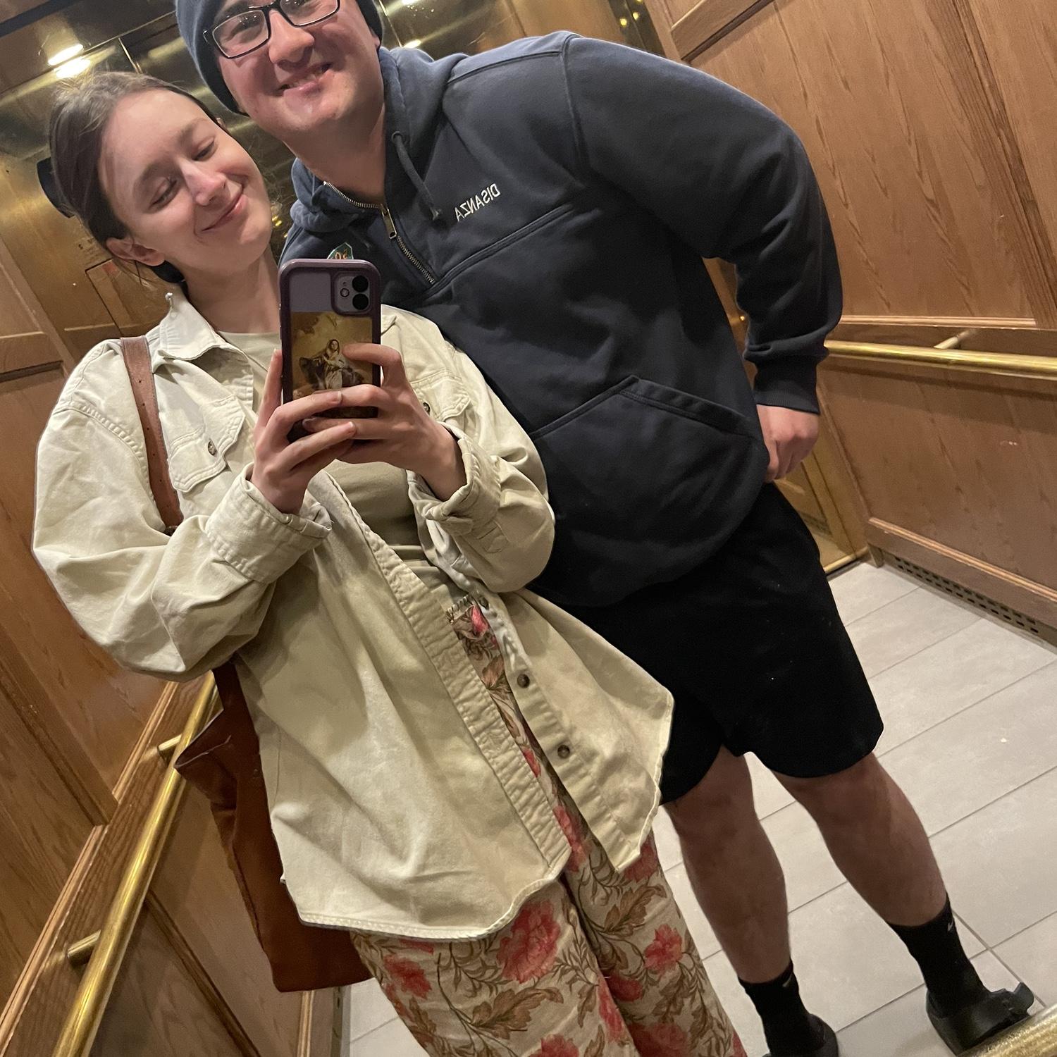 The bride and groom in the elevator right before seeing their baby via ultrasound for the first time!