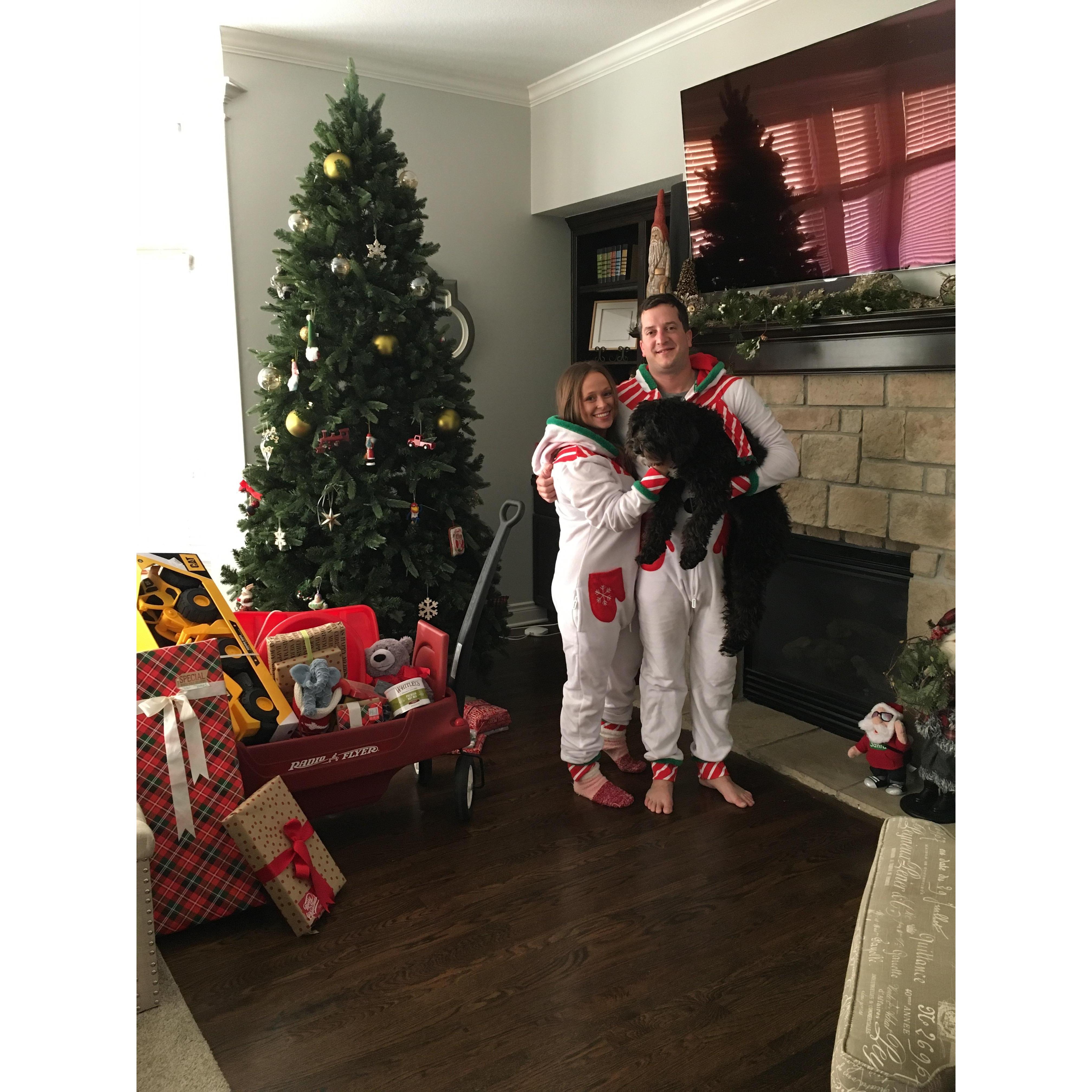 Our first Christmas together. Really got into the matching onesies.