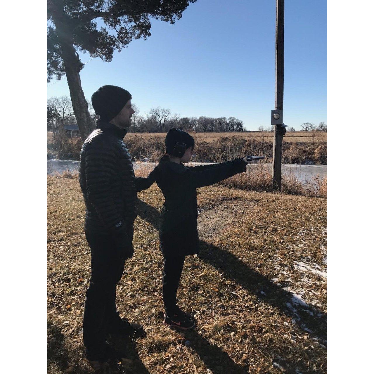 Jon teaching Haley how to shoot