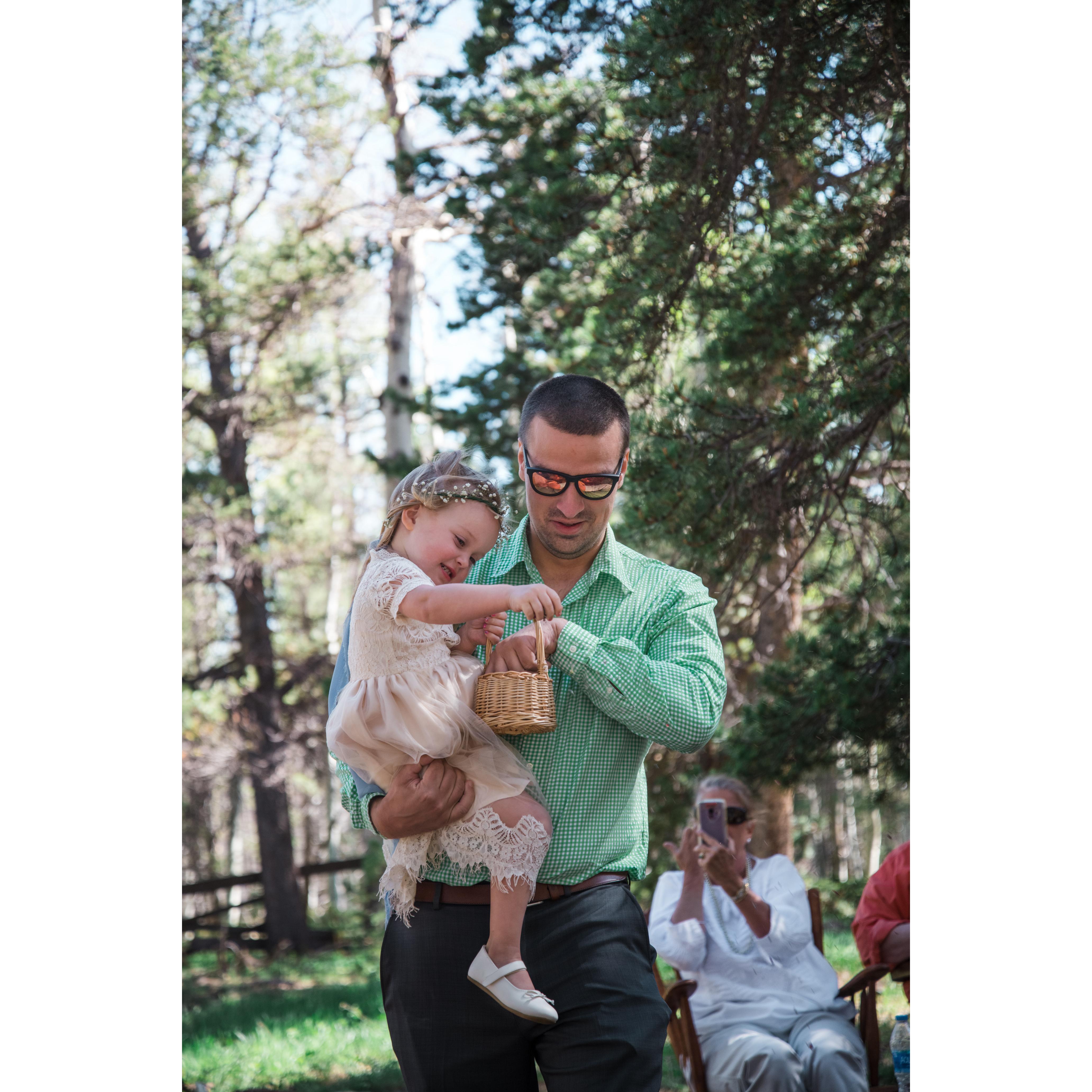 Elin, the flower girl, accompanied by her Dad, Taber's brother, Alden.