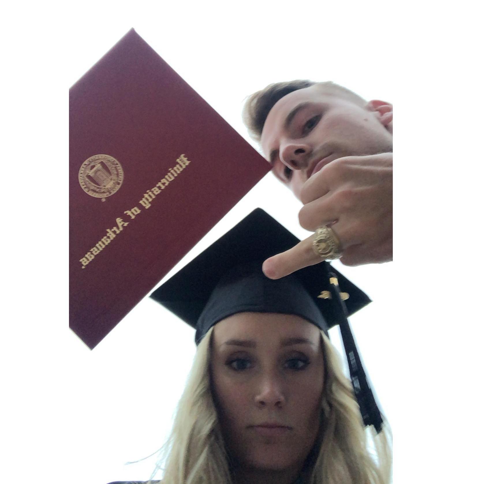 Hannah's college graduation (don't worry, that's not Sam's middle finger. he's just showing off his aggie bling)