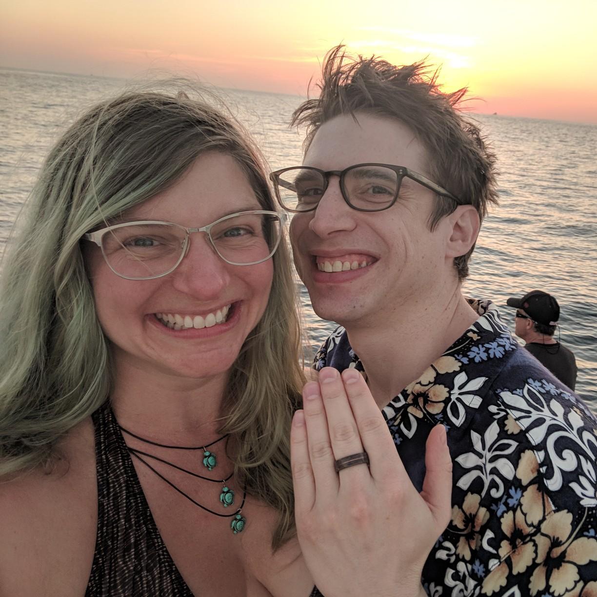 "I missed him so much while I was away! I couldn't imagine waiting any longer to ask him to be my life partner! We took a sunset Cruise, everything was going as planned and I was sure he'd say yes-- but I was so nervous!" -Amy