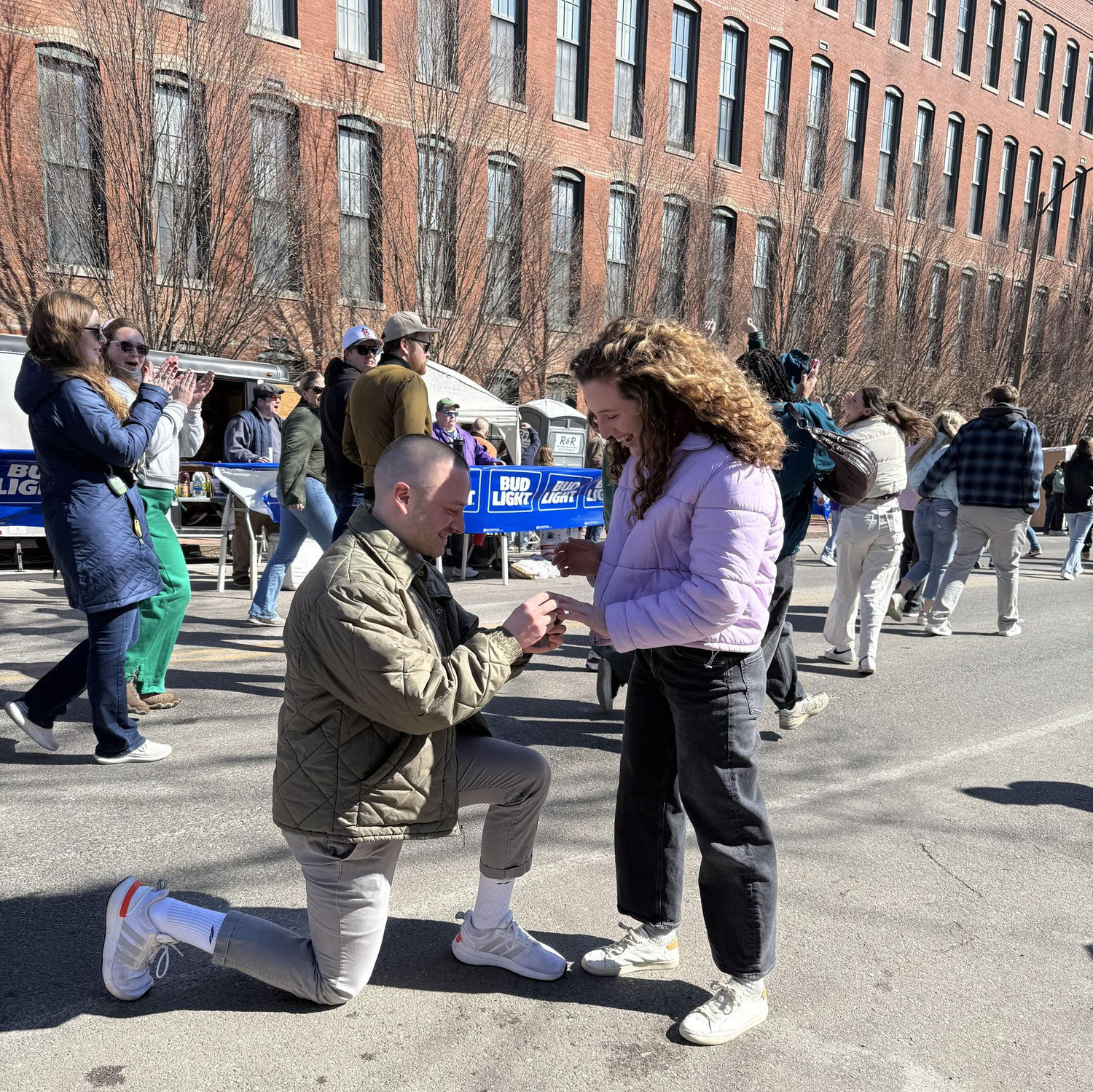 Frank proposed during STL Mardi Gras in Soulard!