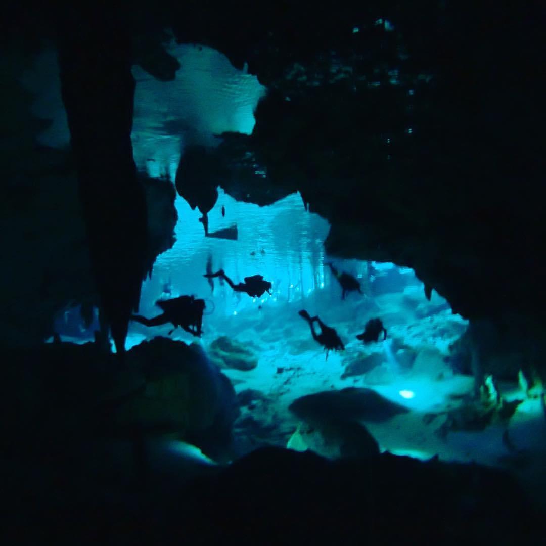 Diving in a cenote in Mexico.