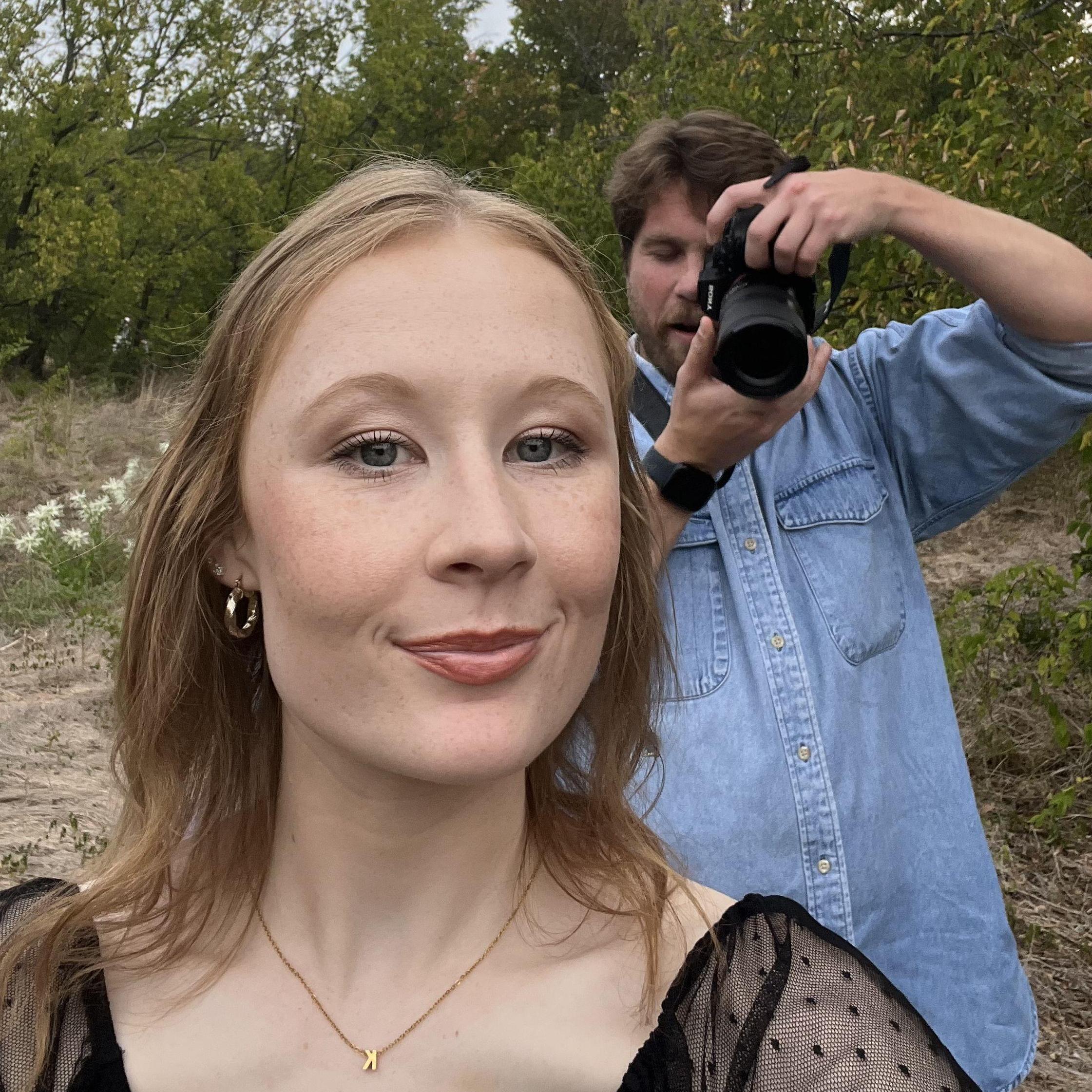 Travis takes photos of me for photography practice