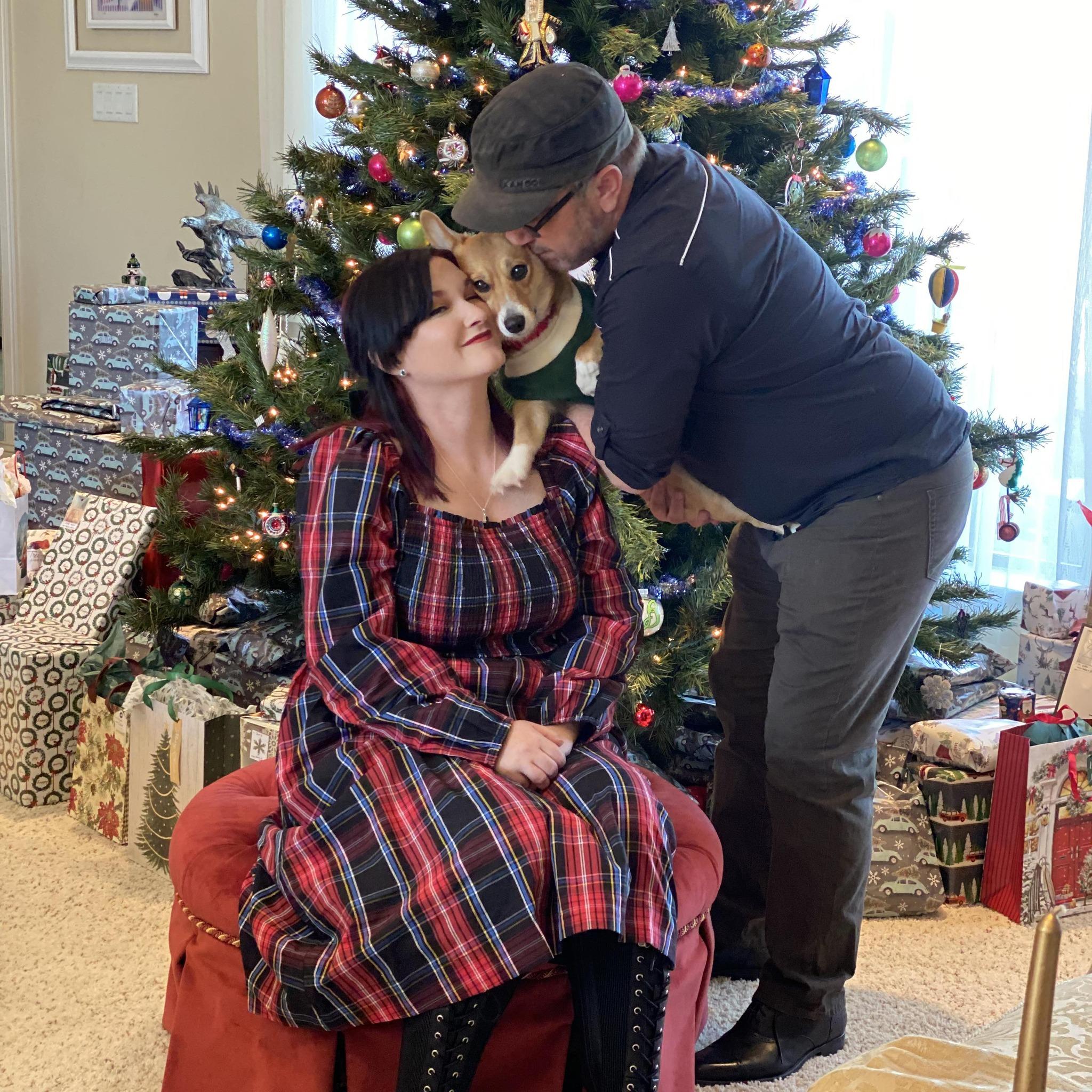 Our family has grown over the years. We have a cat named Tituba and a Corgi named Biscuit. Biscuit will be our ring bearer for the wedding.