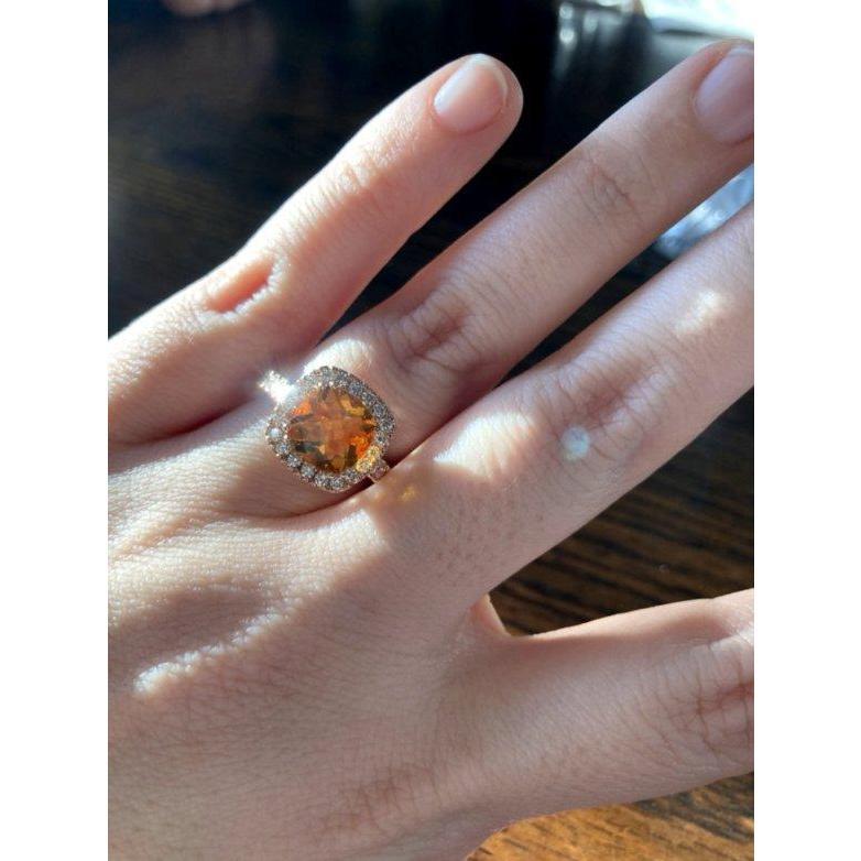 Allison loves the ring *almost* as much as the man. :D