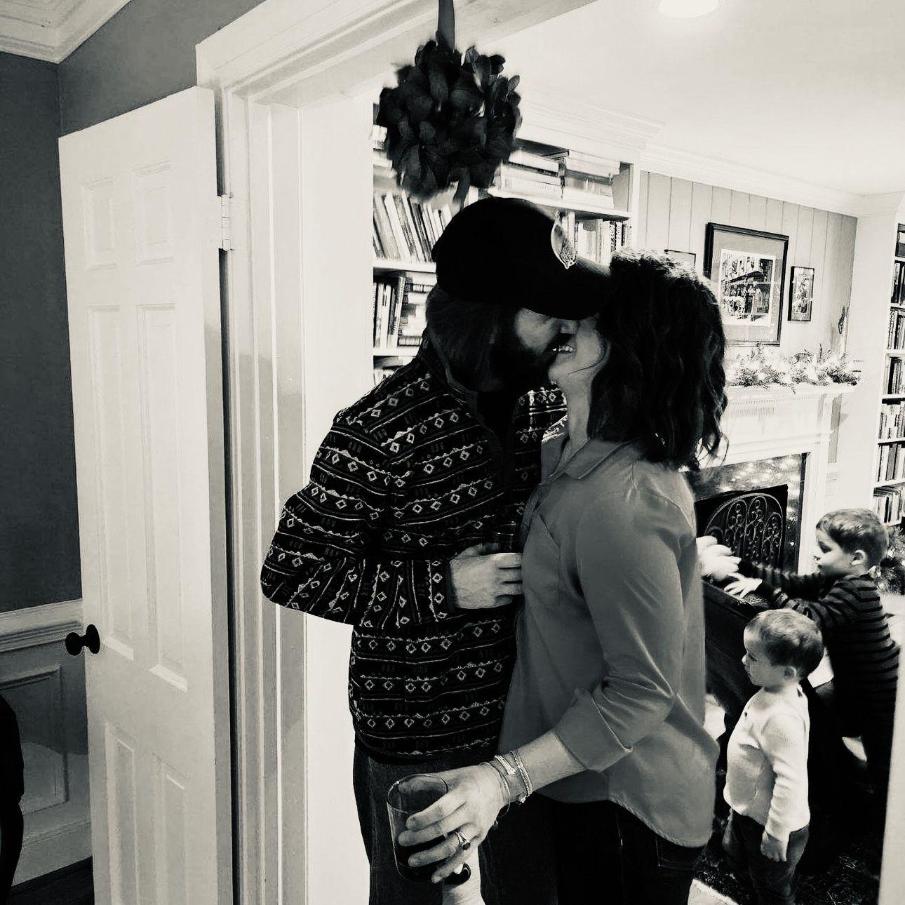 Any excuse to kiss...there was mistletoe...