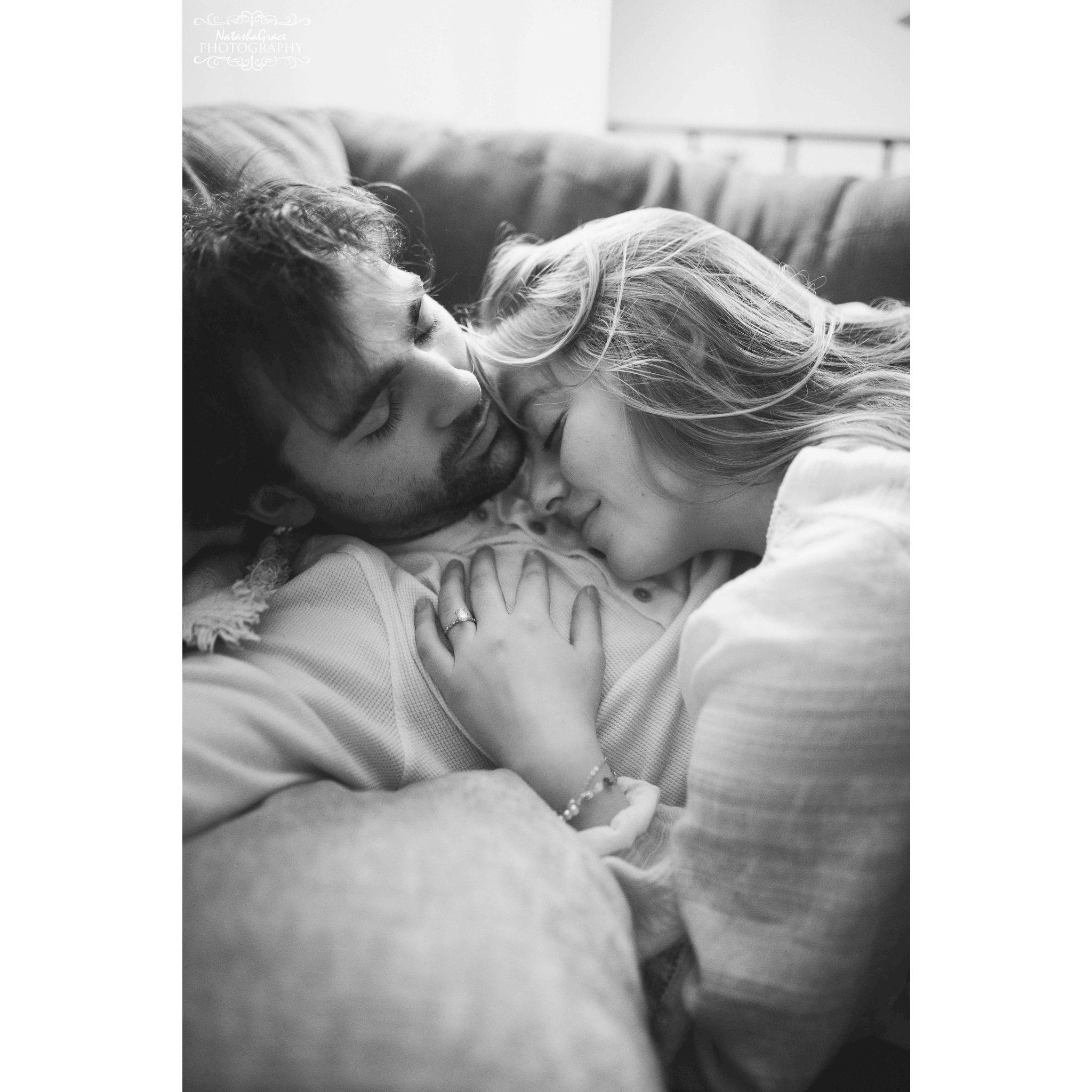 Cuddled up on the couch, one of our favorite places to be. <3 (: