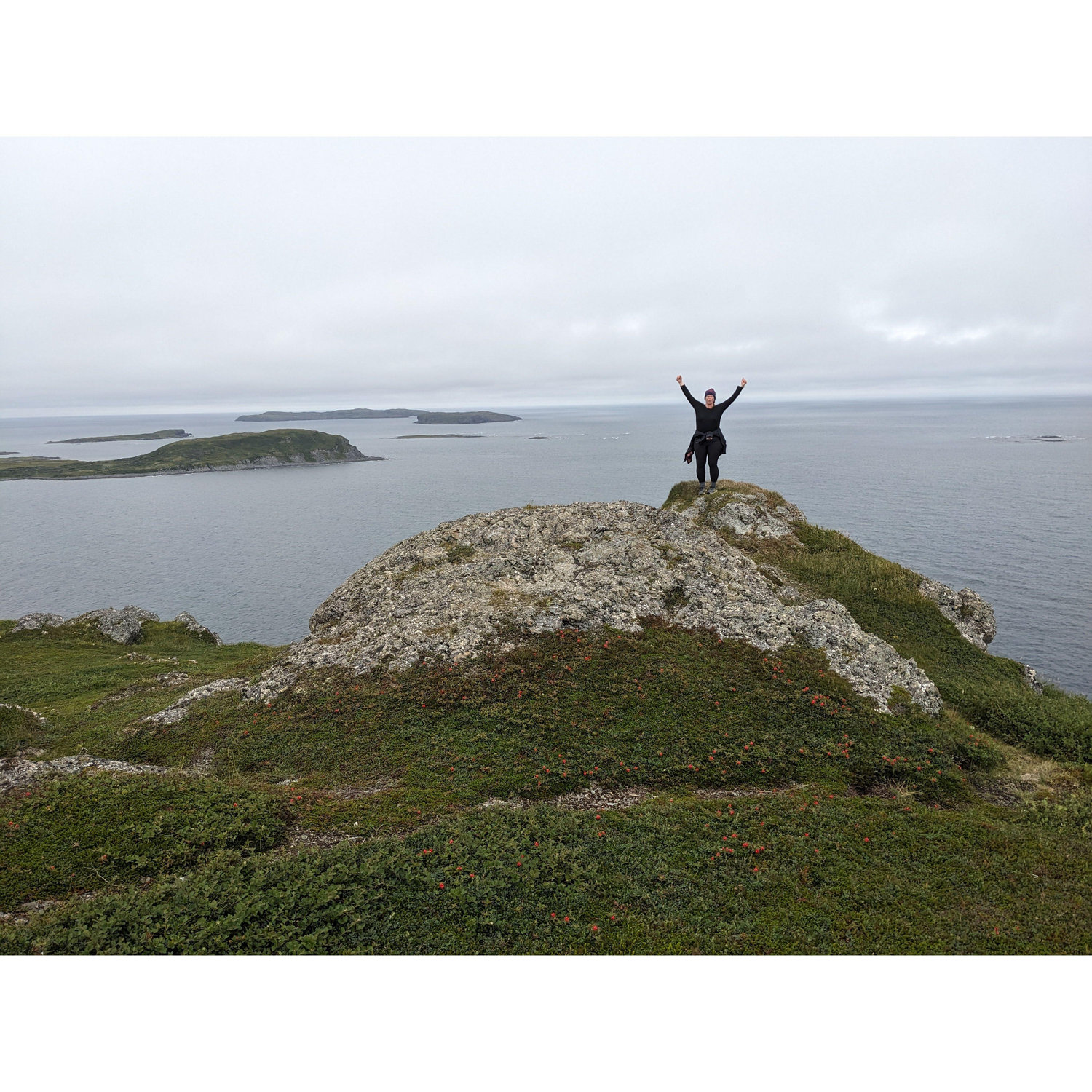 A newly-engaged Lisa on a Newfoundland hilltop.