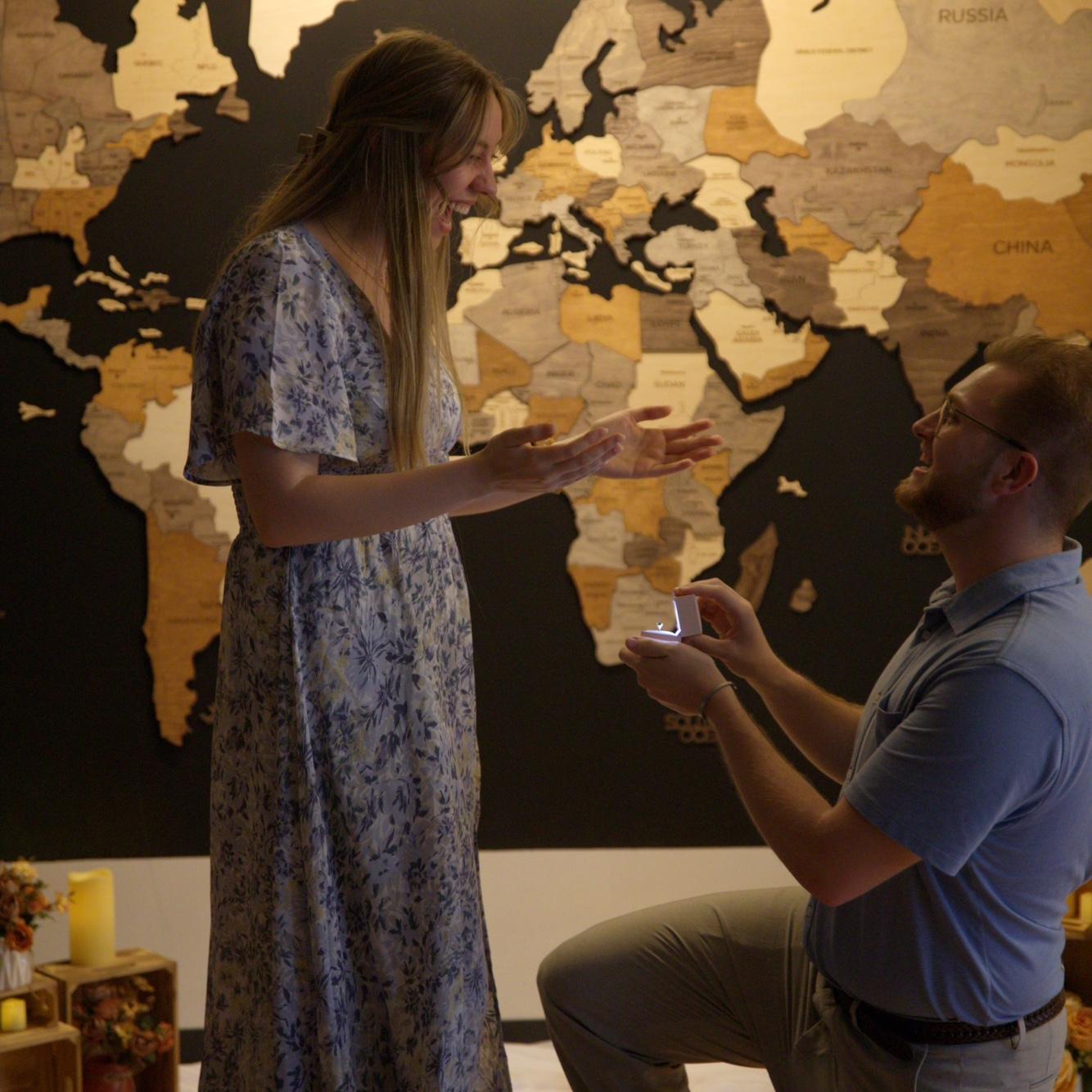 Matt proposed on April 17 at the church where we reconnected, in front of the world map! It was beautiful and perfect.