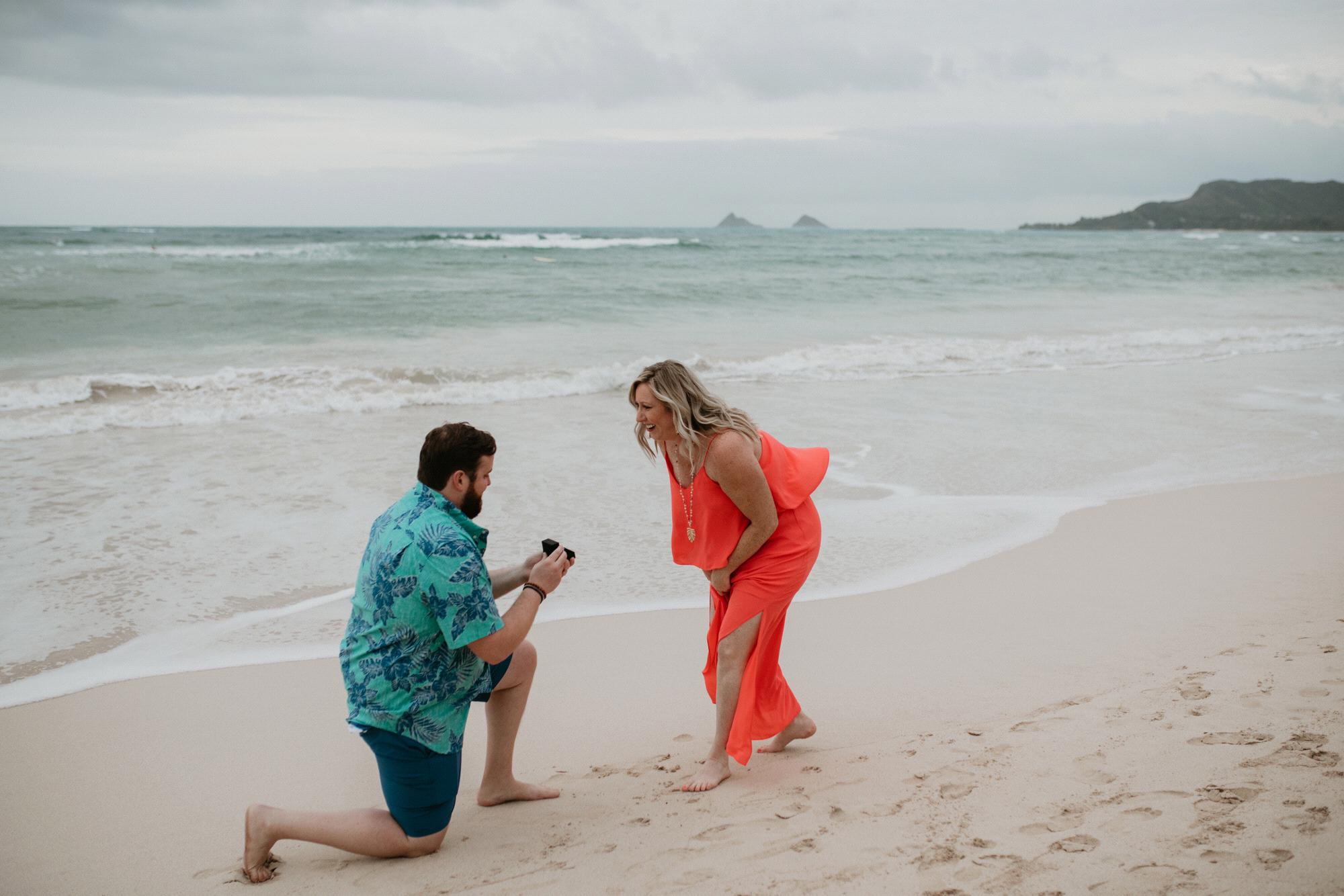 Perfectly planned surprise proposal at Kailua Beach at sunset on Christmas Eve!