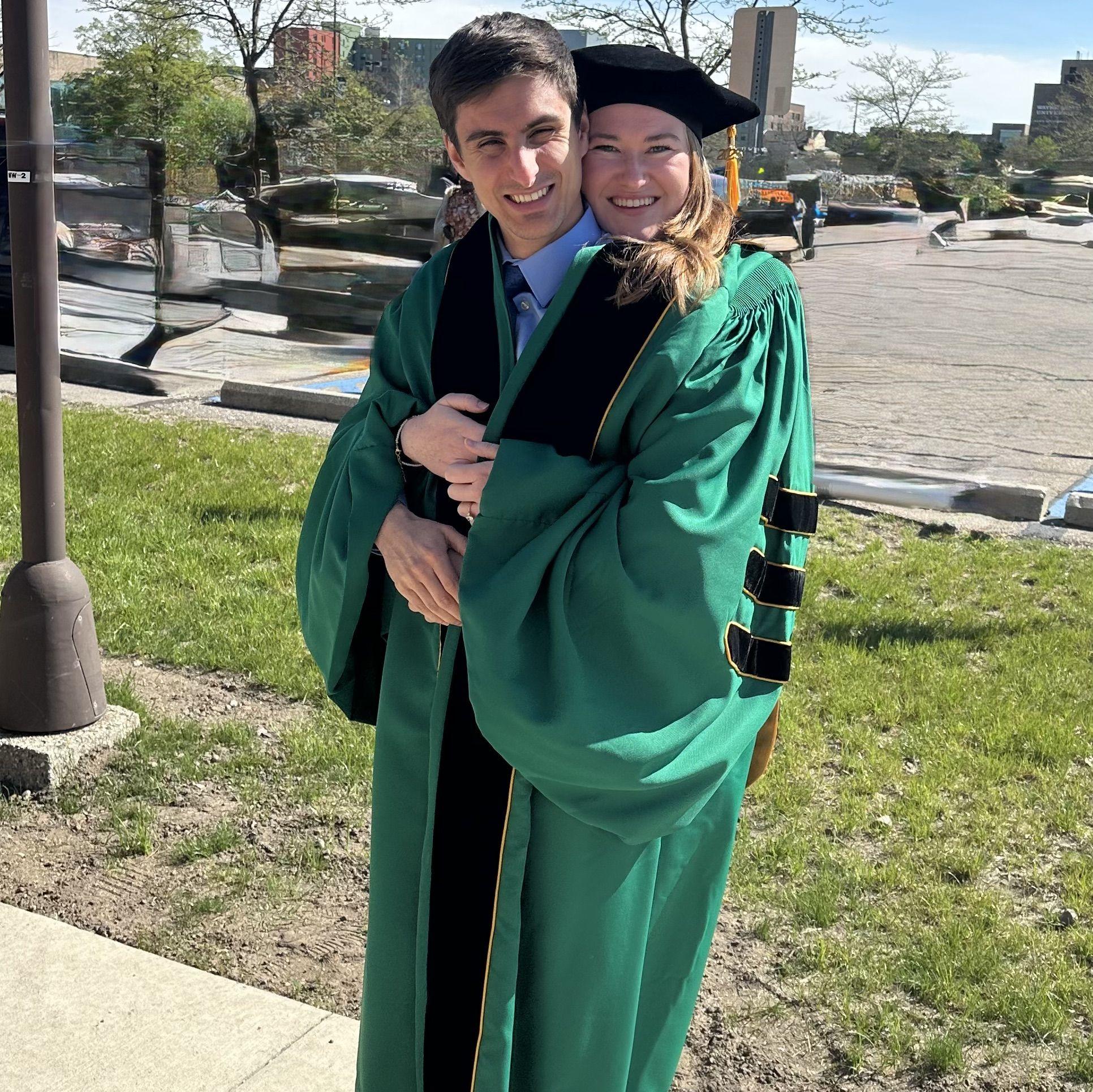 Celebrating Brenna's graduation from her PhD program together in Detroit, May 2025.