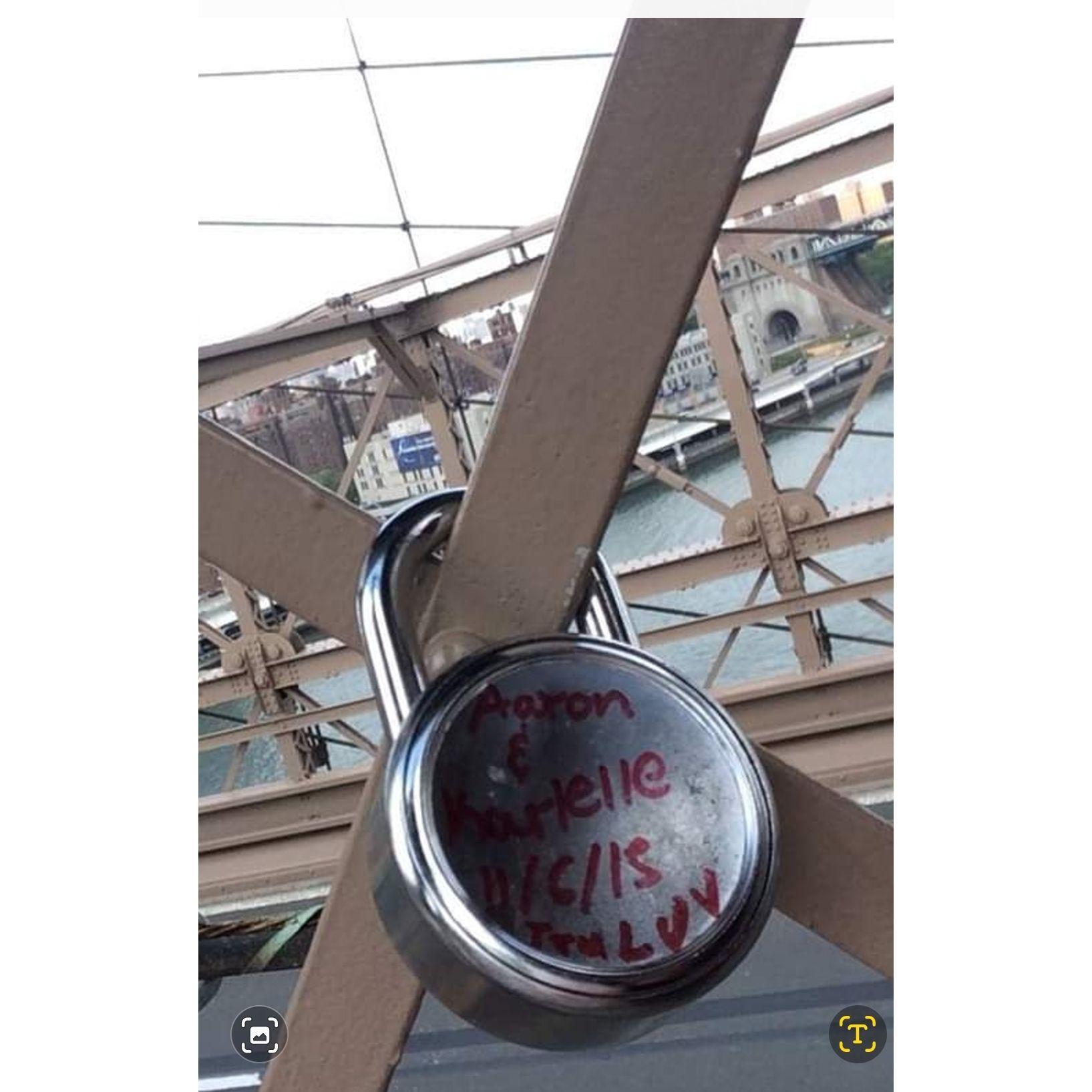 We wrote our names and the date on this lock and than locked it in,  on the Brooklyn Bridge