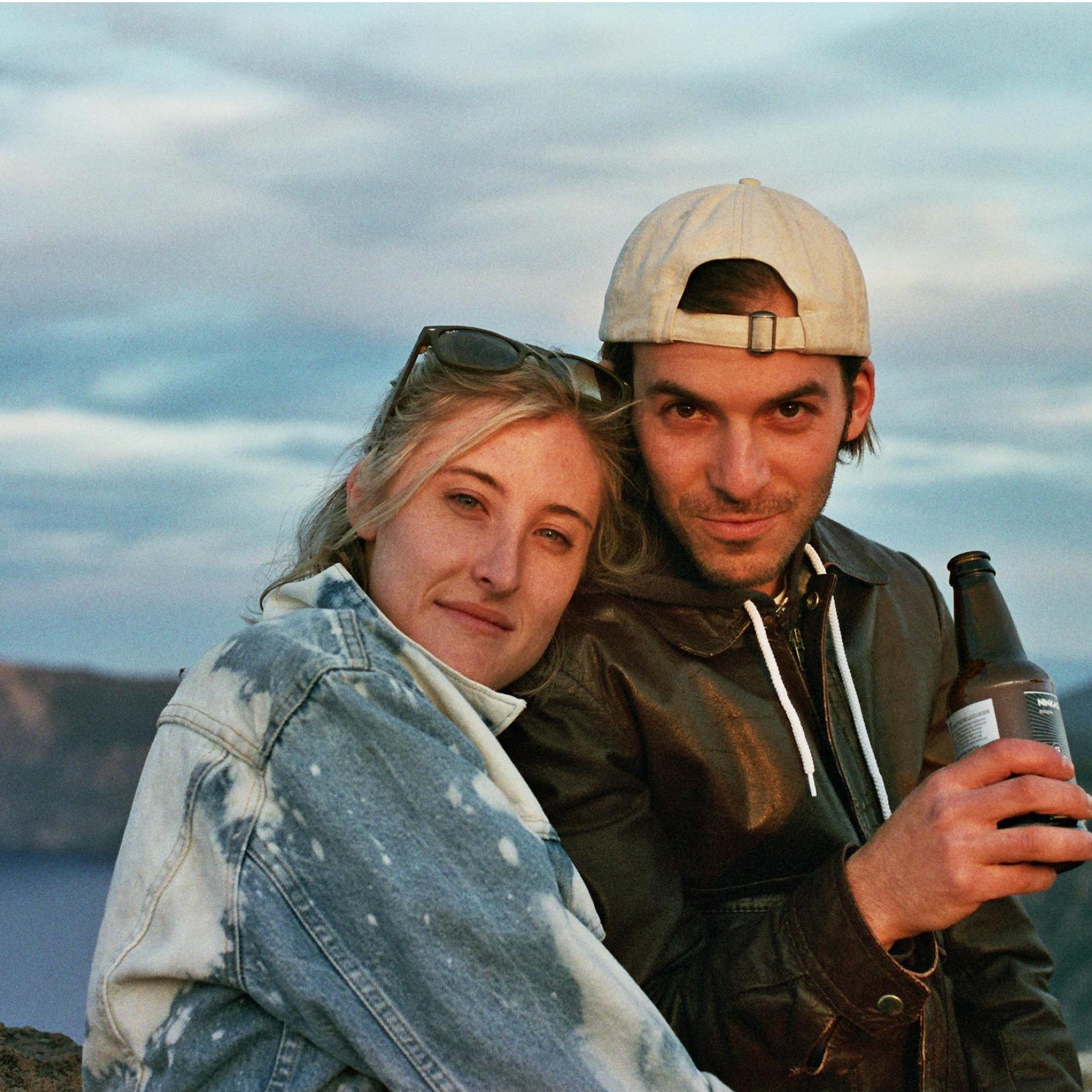 Our friend T took this picture of us after we hiked and reached the top of a trail overlooking Crater Lake. We all shared a celebratory drink as we watched the sunset. It was a beautiful day!