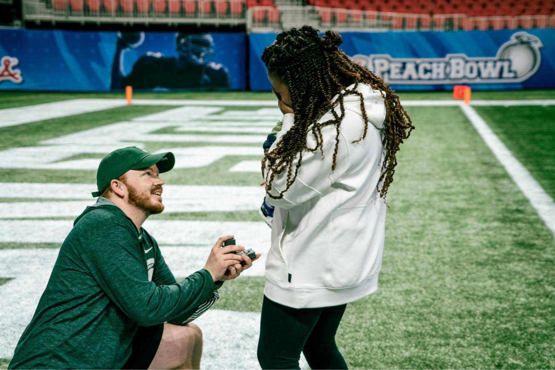 What a surprise! First Bowl Game & super surprised proposal!  Ryan picked the ring all out on his own!
