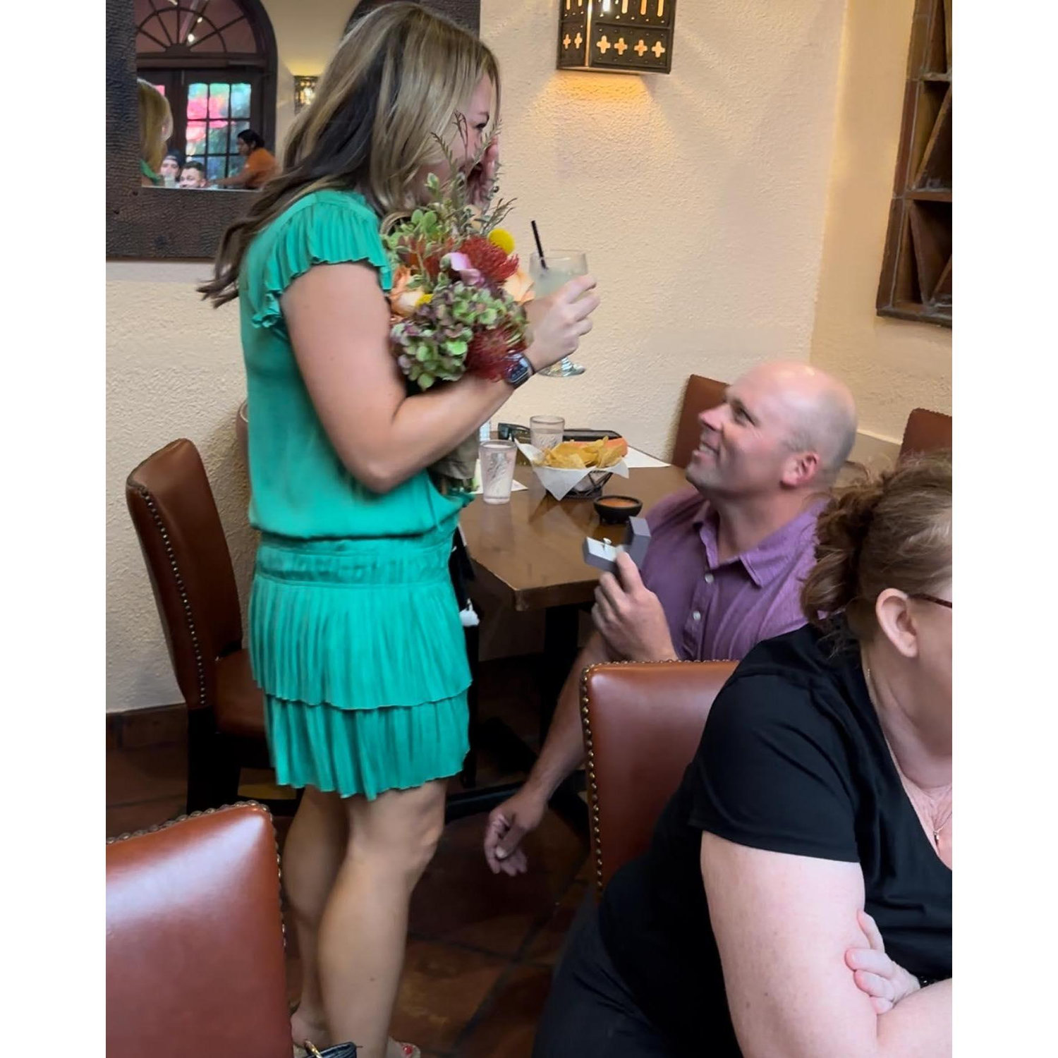 The proposal - at the restaurant of our first one on one date, Matt's El Rancho, in Austin.