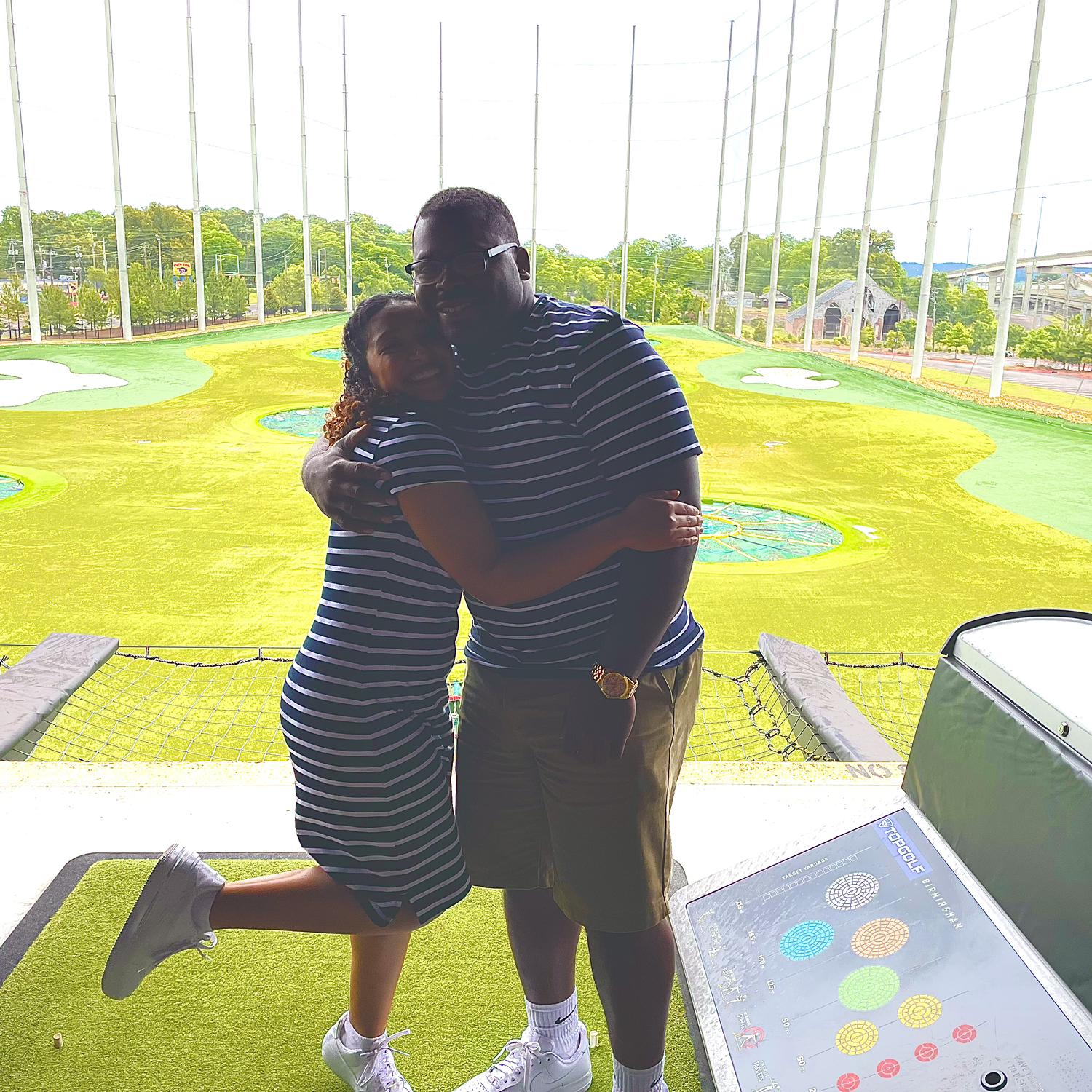 Us at Top Golf.