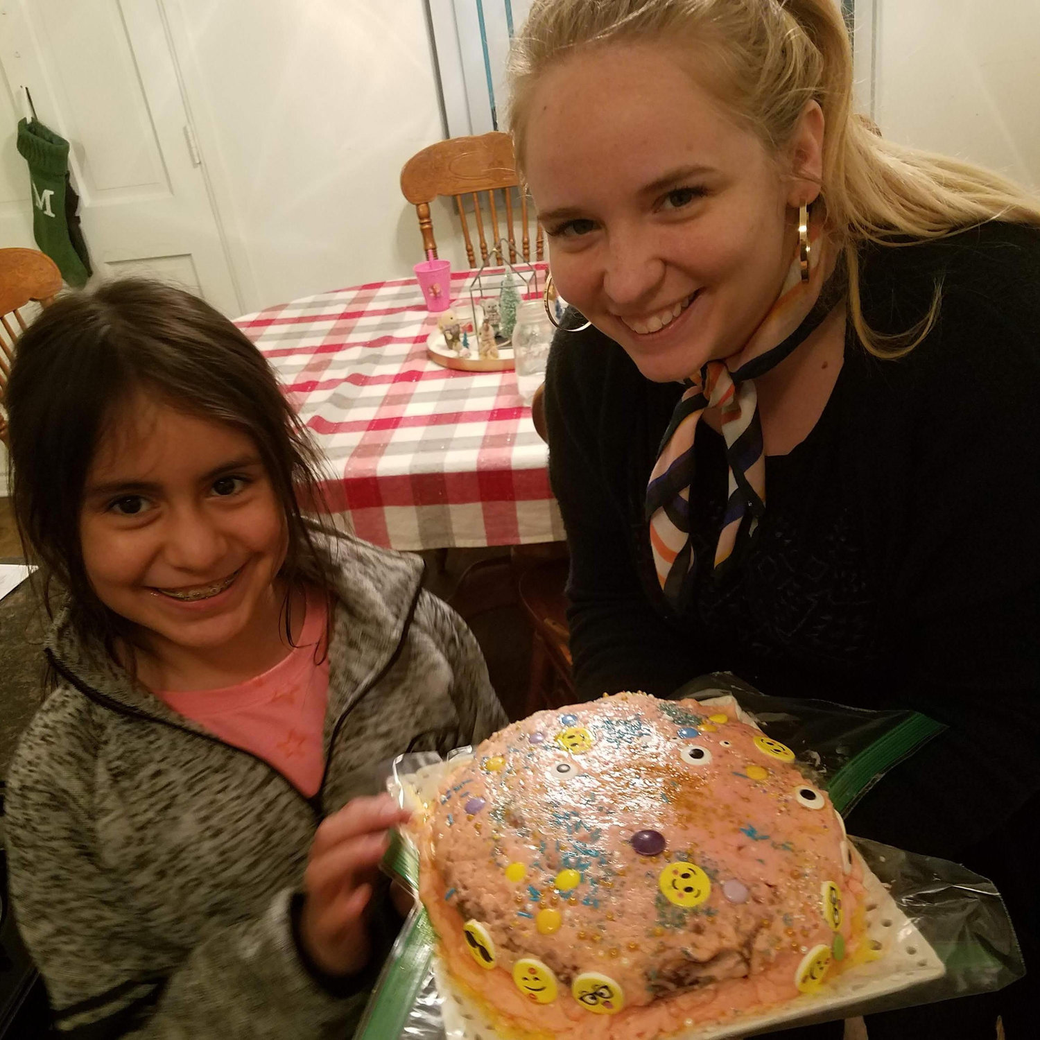 Krysta and Mia enjoy baking together as their relationship grows.