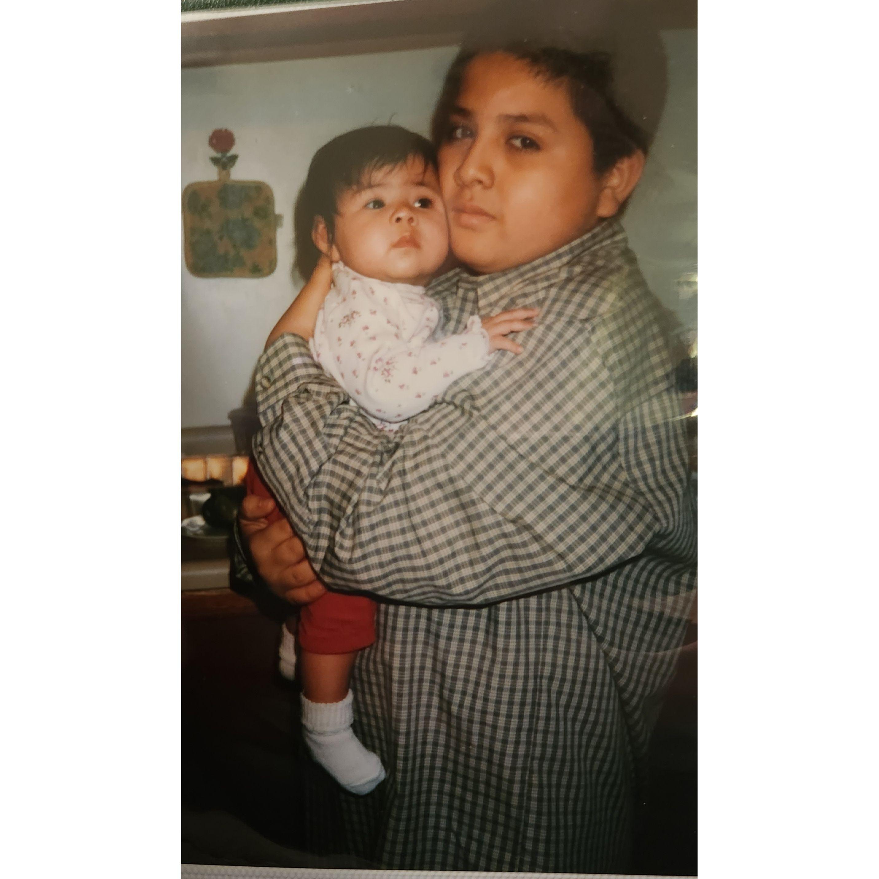 Freddy holding his sister Karina. He will always be her protector