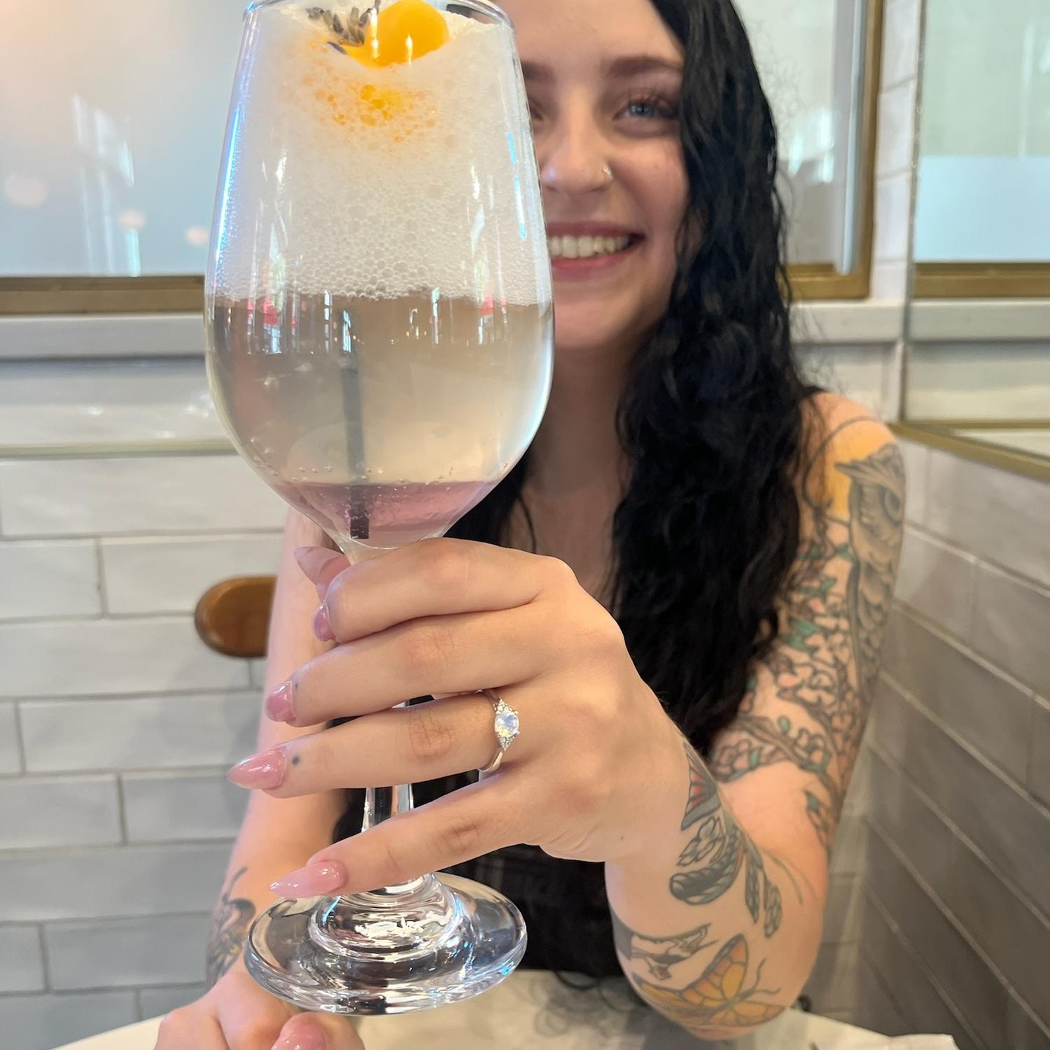 Ani enjoying a lavender bubble bath Bellini with a rubber ducky in it, while showing off her ring, of course. (Savannah, GA)