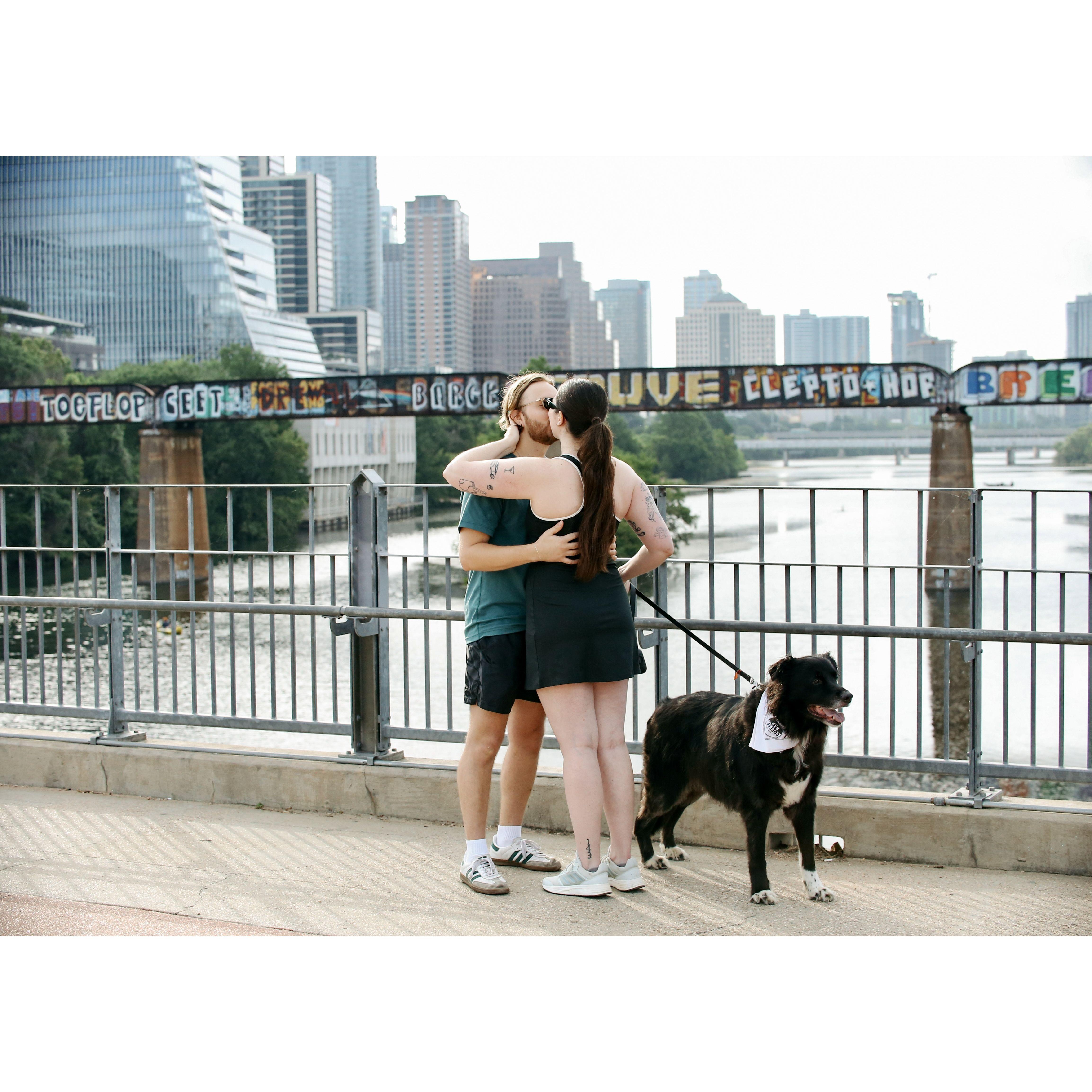 engagement on the pedestrian bridge downtown